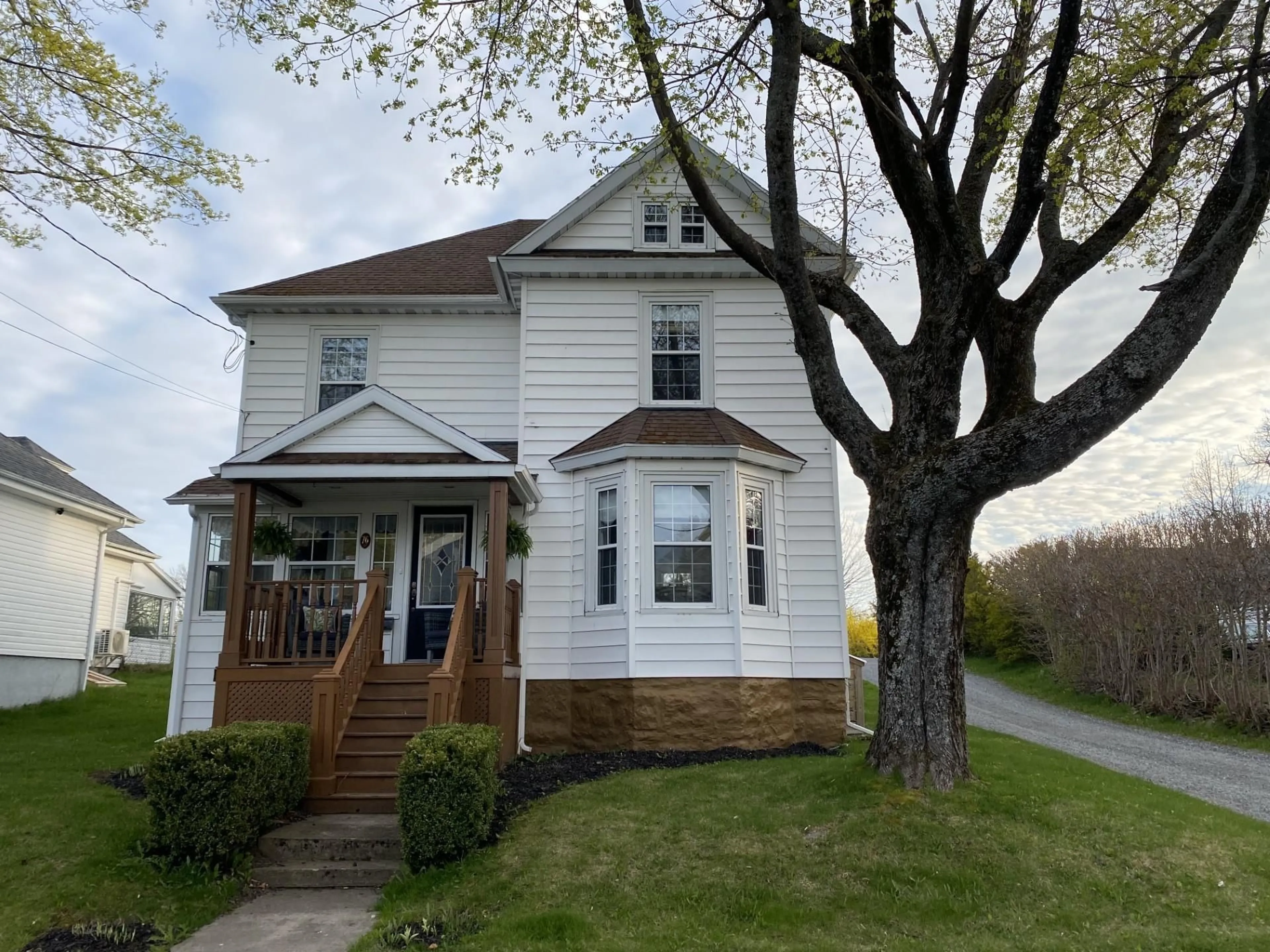 Home with vinyl exterior material, street for 76 Archibald Ave, North Sydney Nova Scotia B2A 2X1