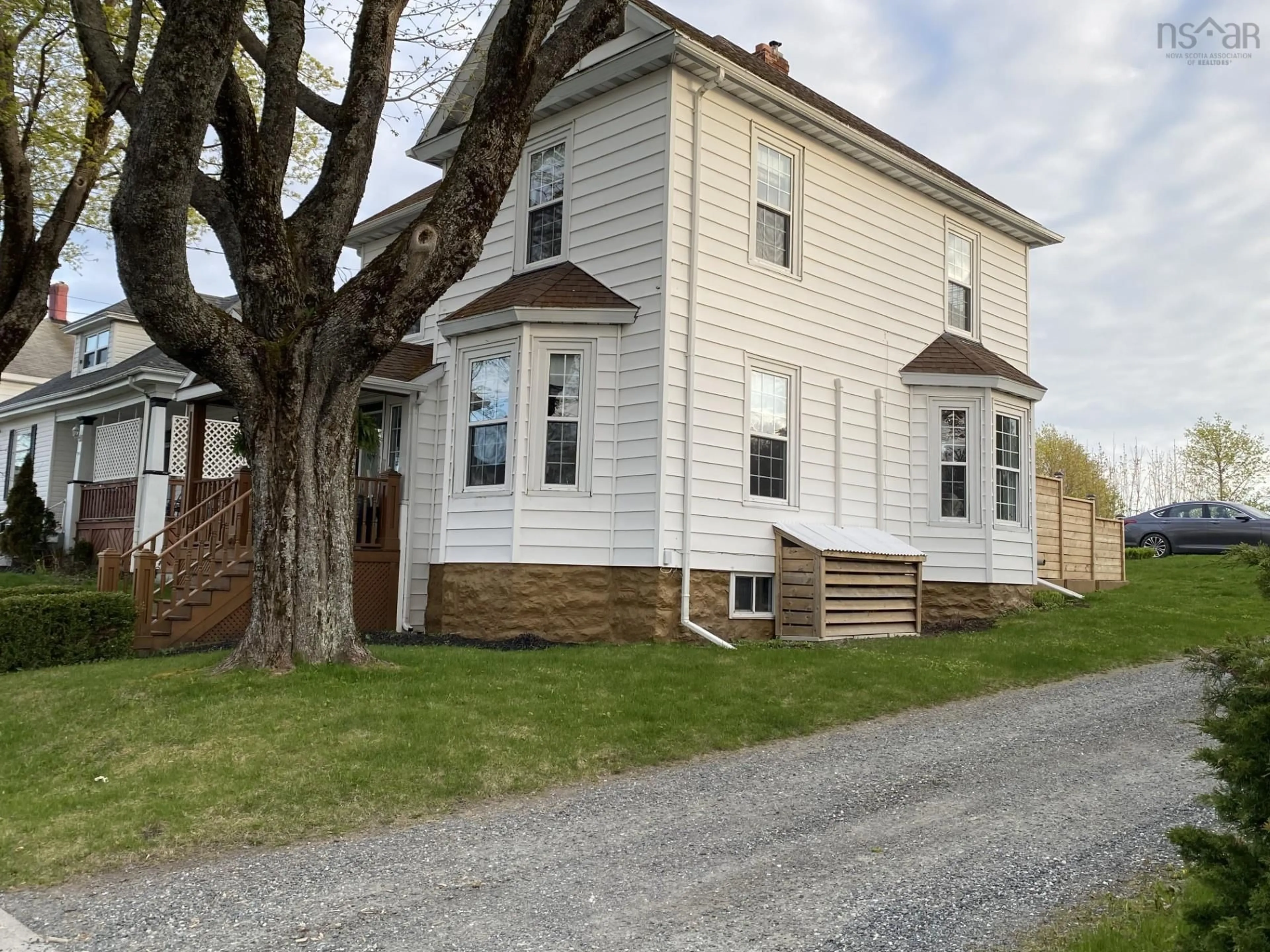 Home with vinyl exterior material, street for 76 Archibald Ave, North Sydney Nova Scotia B2A 2X1