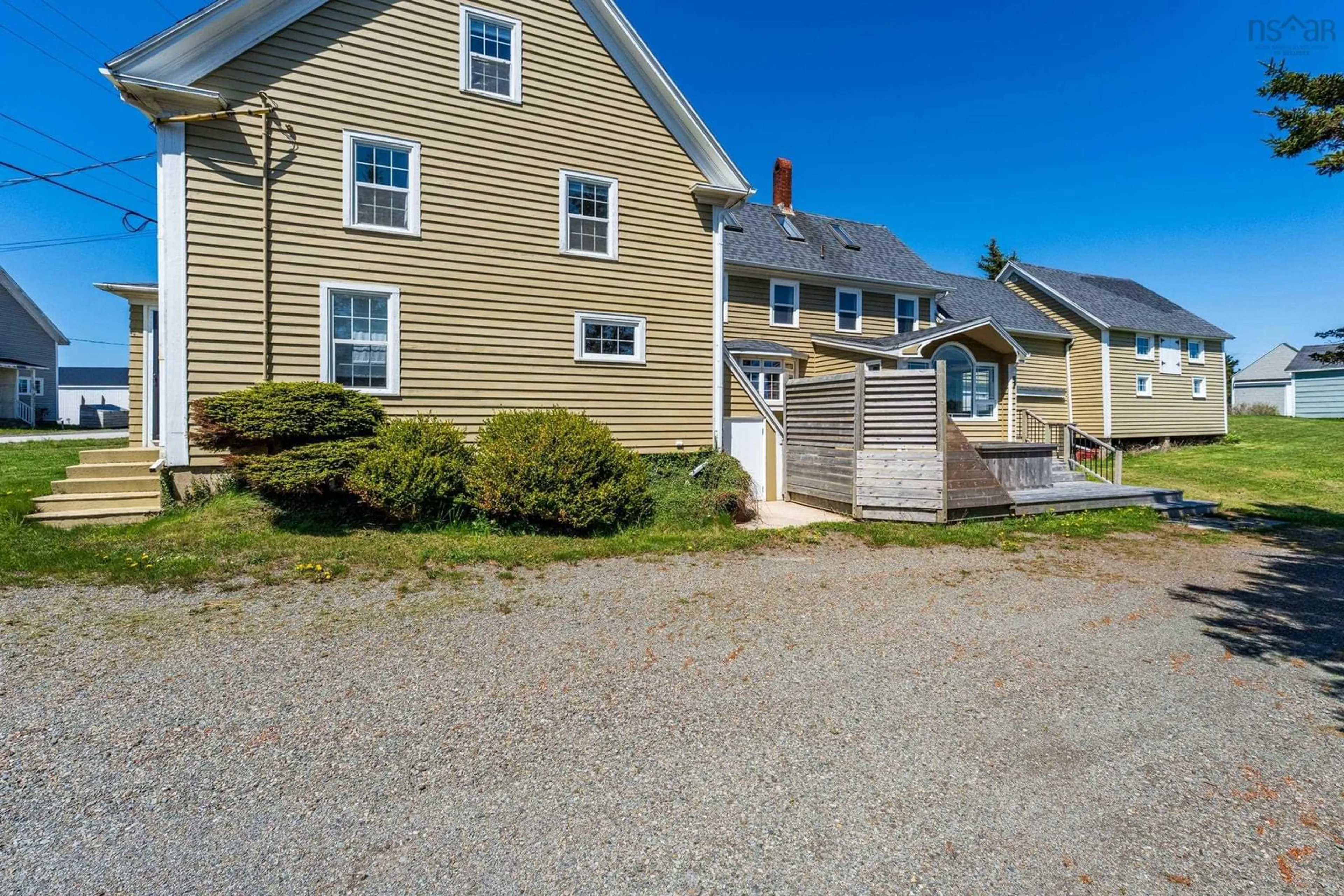 A pic from outside/outdoor area/front of a property/back of a property/a pic from drone, street for 9080 Highway 1, Meteghan River Nova Scotia B0W 2L0
