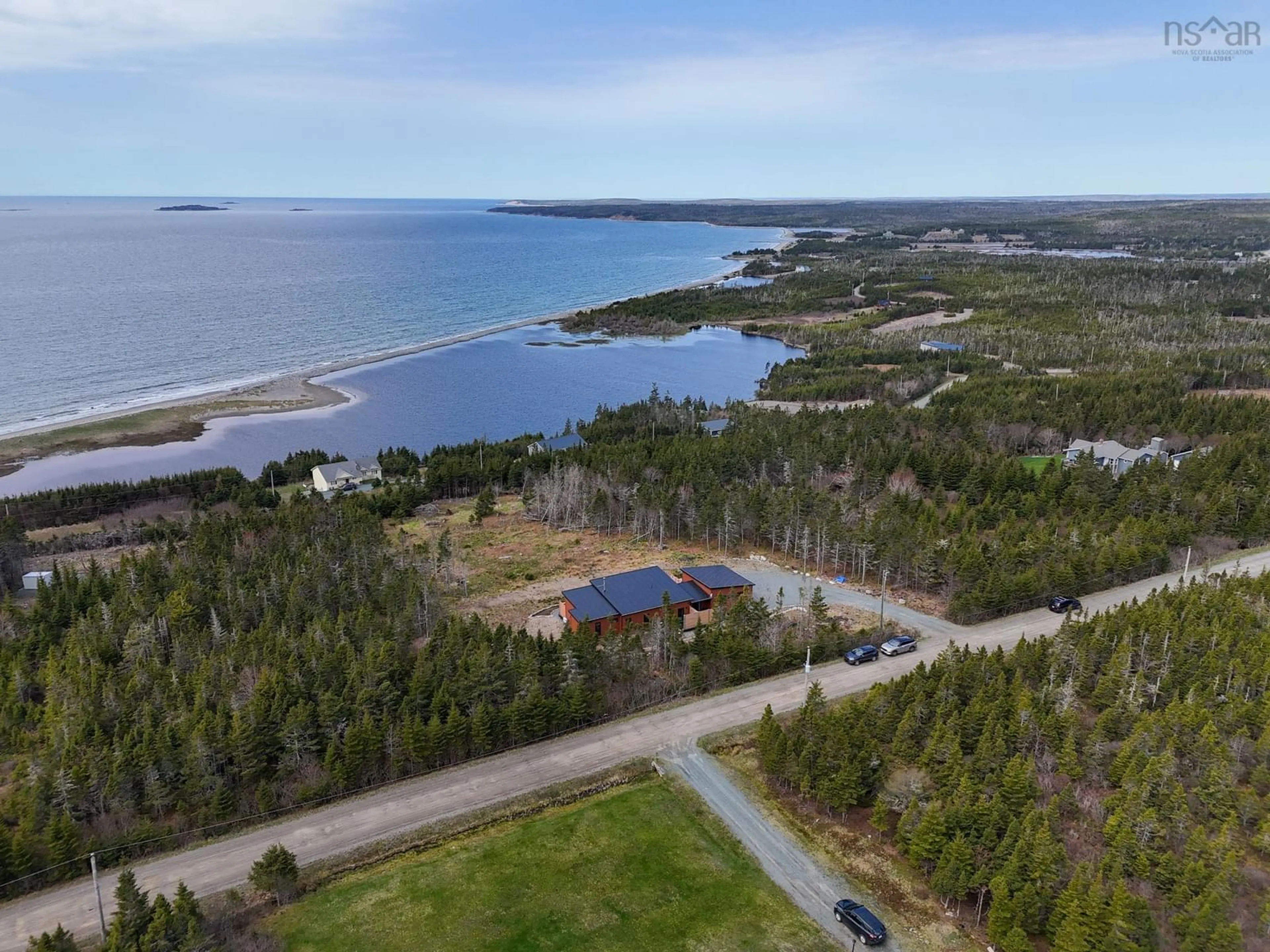 A pic from outside/outdoor area/front of a property/back of a property/a pic from drone, water/lake/river/ocean view for 110 Kaakwogook Way, Clam Bay Nova Scotia B0J 2L0