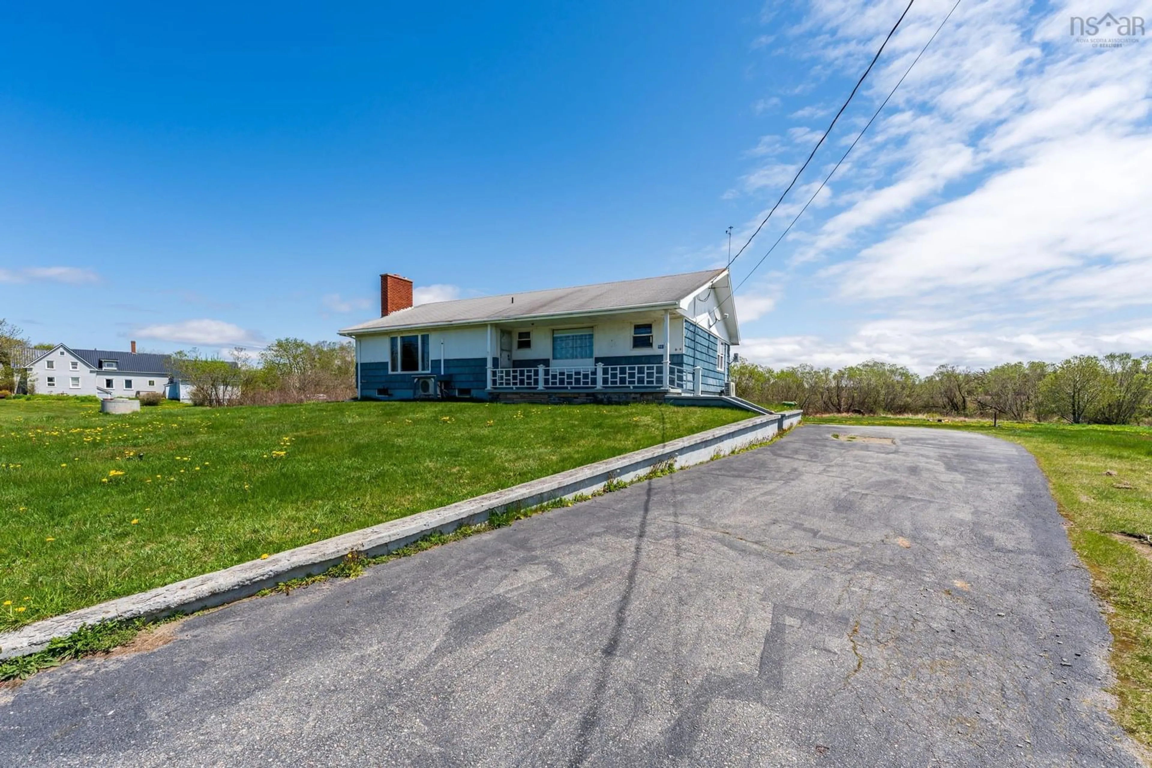 A pic from outside/outdoor area/front of a property/back of a property/a pic from drone, building for 9490 Highway 1, Lower Saulnierville Nova Scotia B0W 2Z0