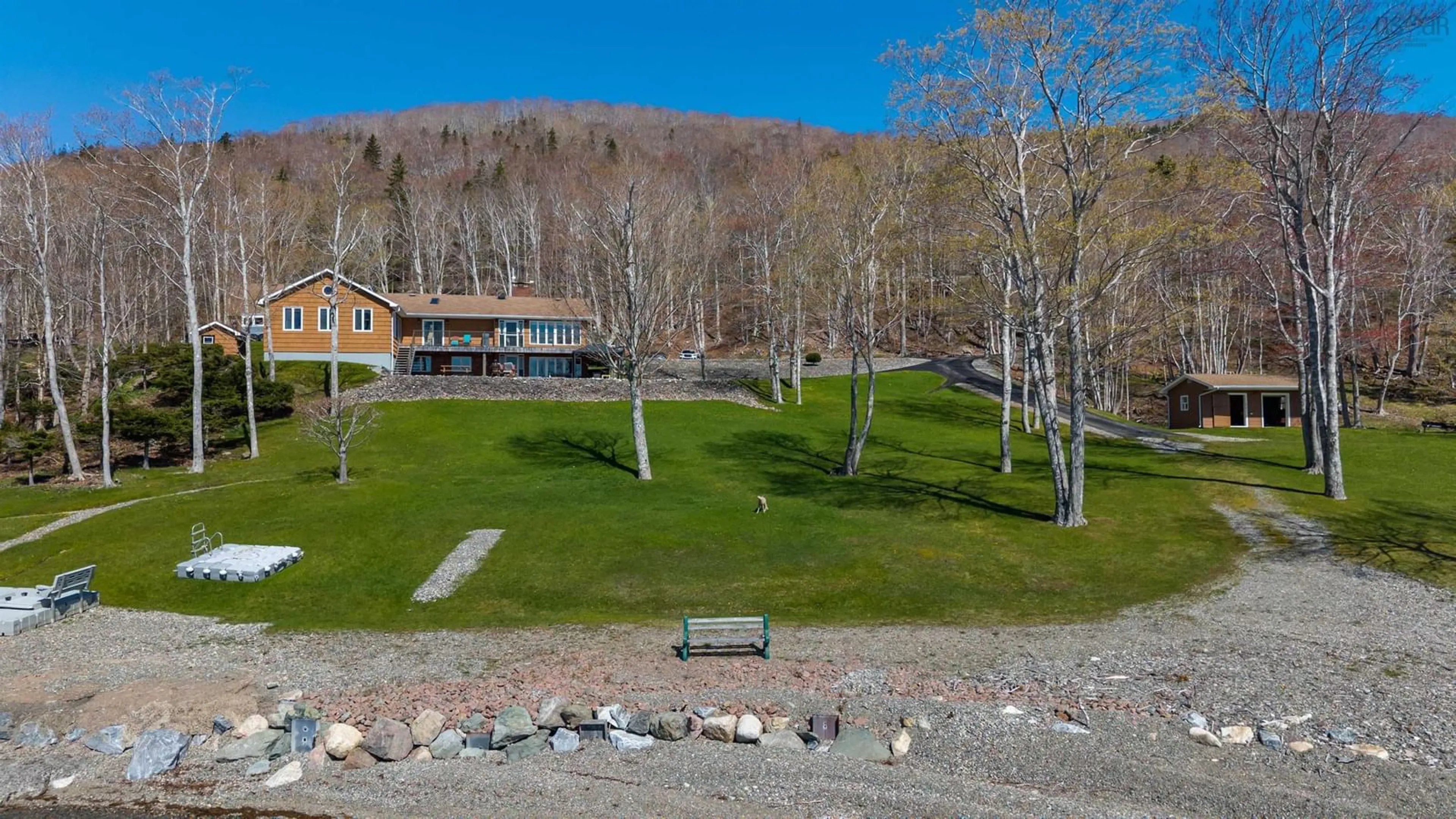 A pic from outside/outdoor area/front of a property/back of a property/a pic from drone, water/lake/river/ocean view for 3940 Marble Mountain Rd, Lime Hill Nova Scotia B0E 2Y0