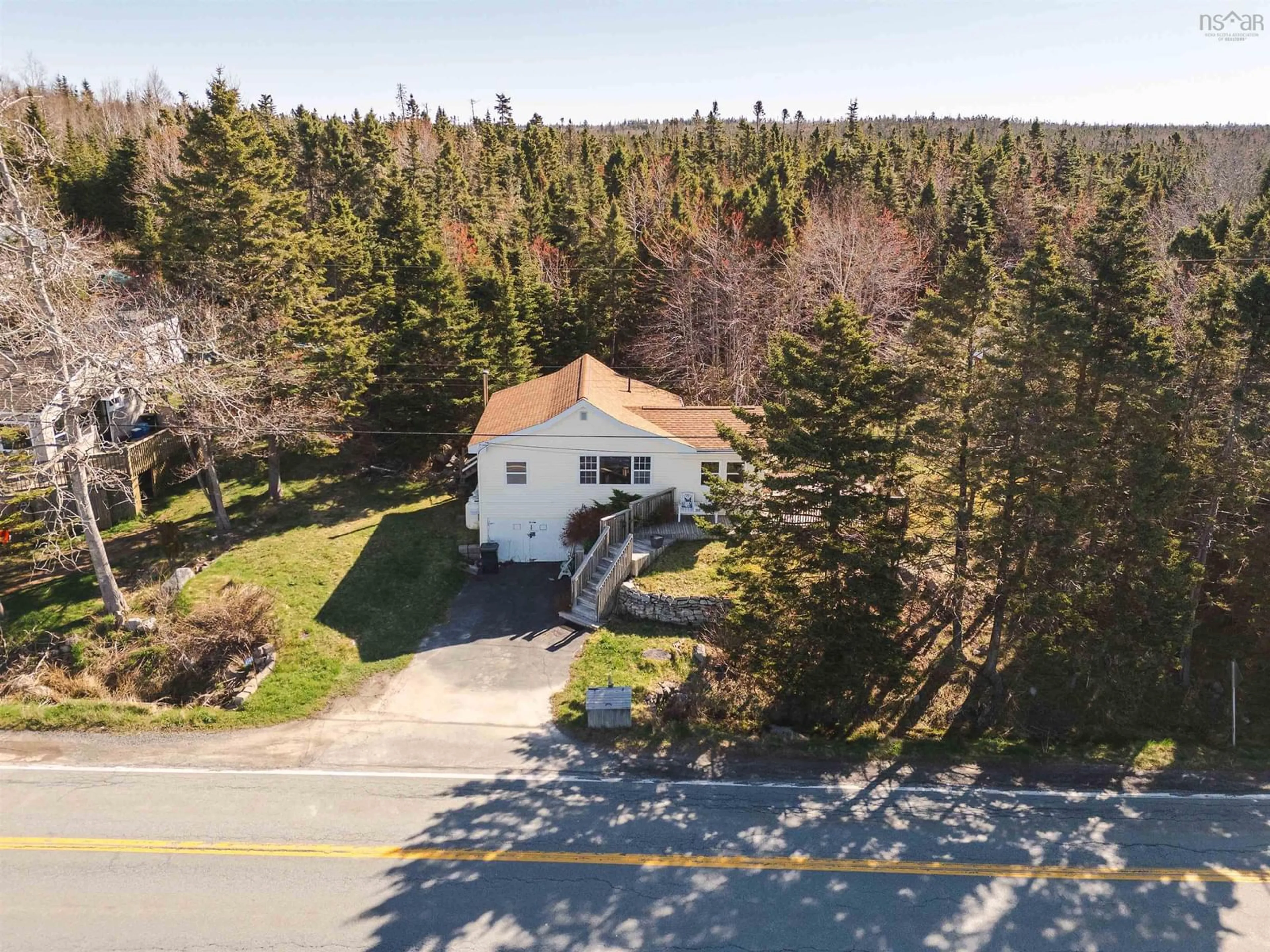A pic from outside/outdoor area/front of a property/back of a property/a pic from drone, street for 4141 Prospect Rd, Shad Bay Nova Scotia B3T 2C1