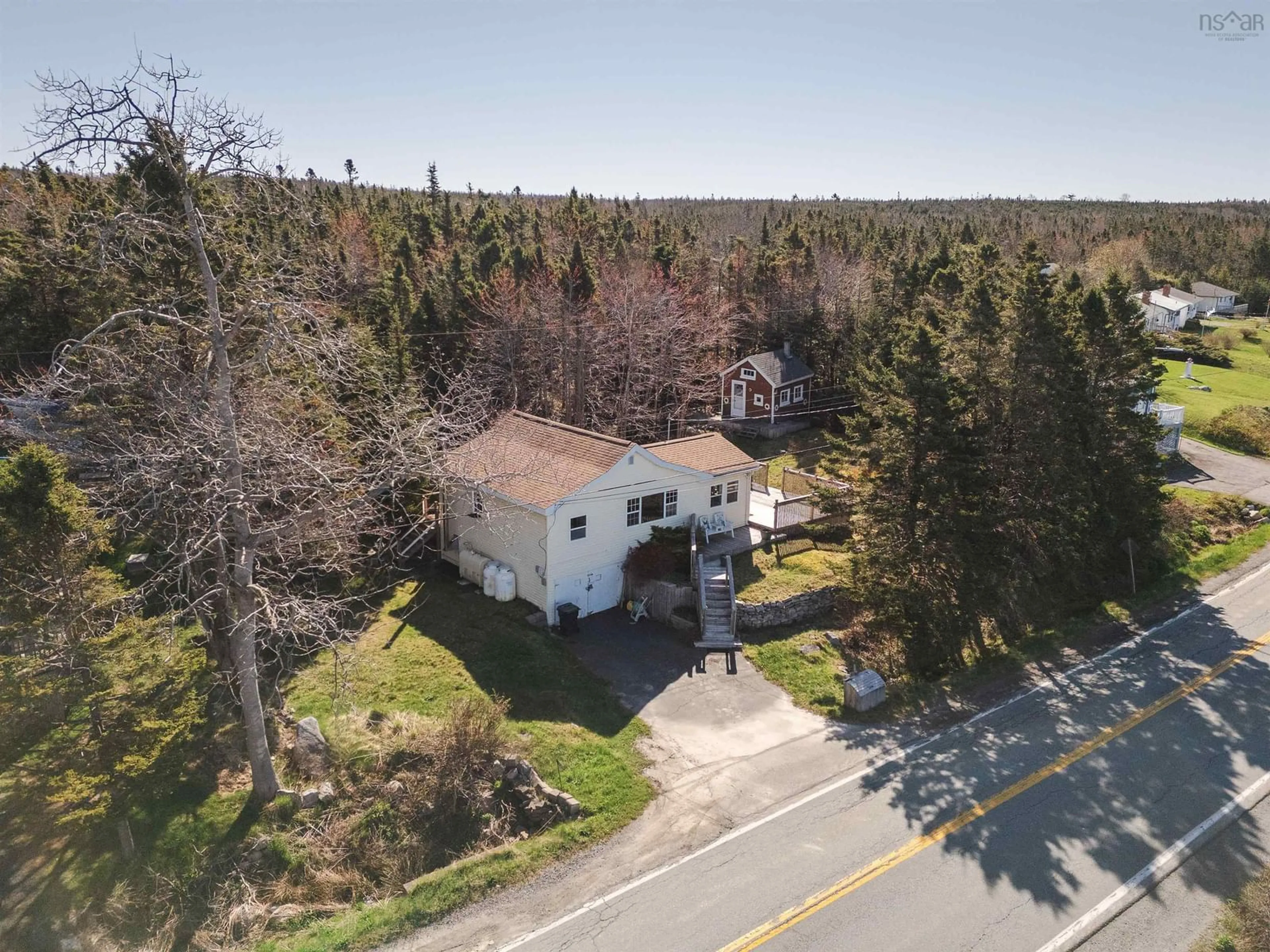 A pic from outside/outdoor area/front of a property/back of a property/a pic from drone, street for 4141 Prospect Rd, Shad Bay Nova Scotia B3T 2C1