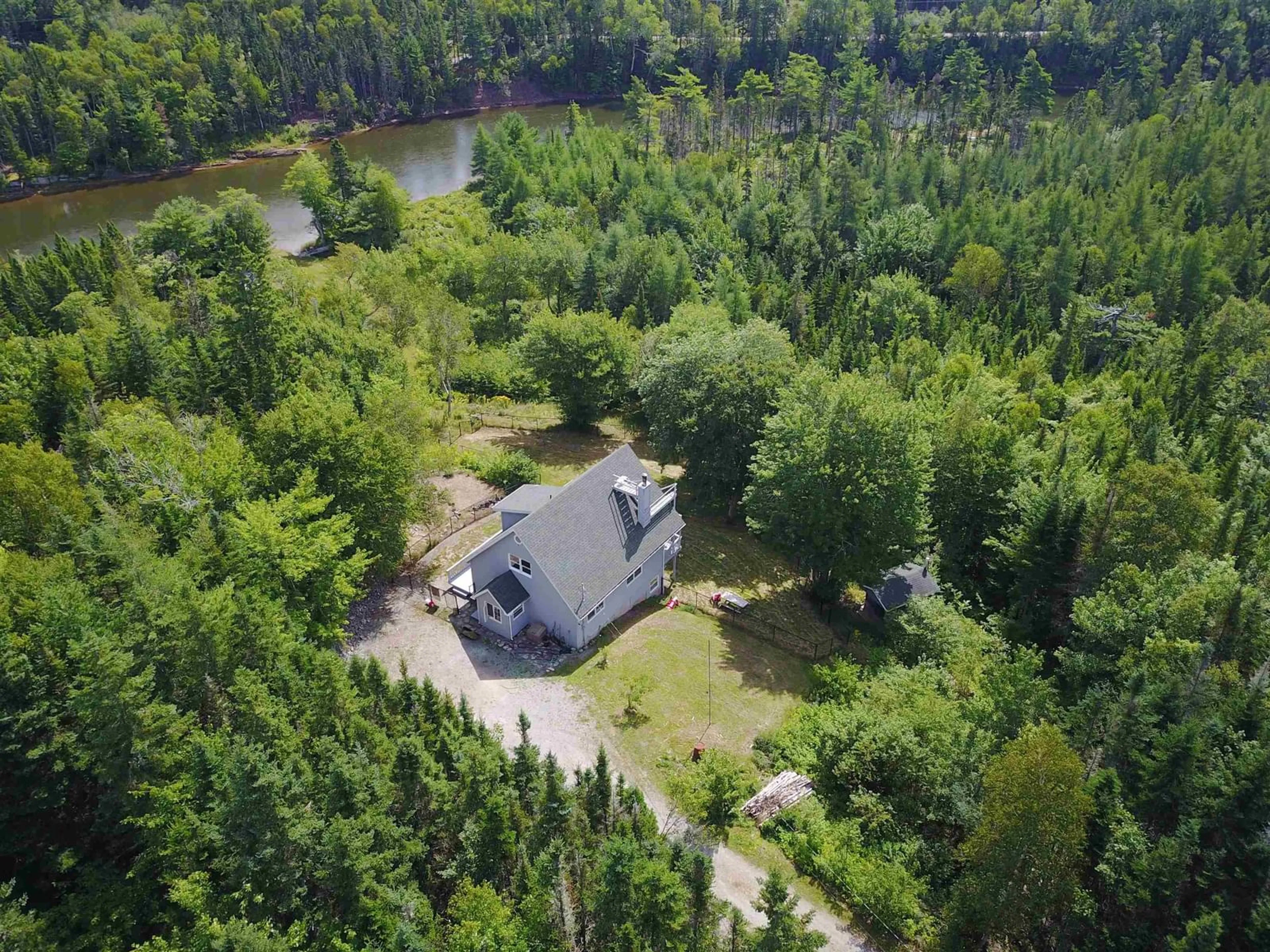 A pic from outside/outdoor area/front of a property/back of a property/a pic from drone, water/lake/river/ocean view for 215 Helmuts Lane, Cleveland Nova Scotia B0E 1J0