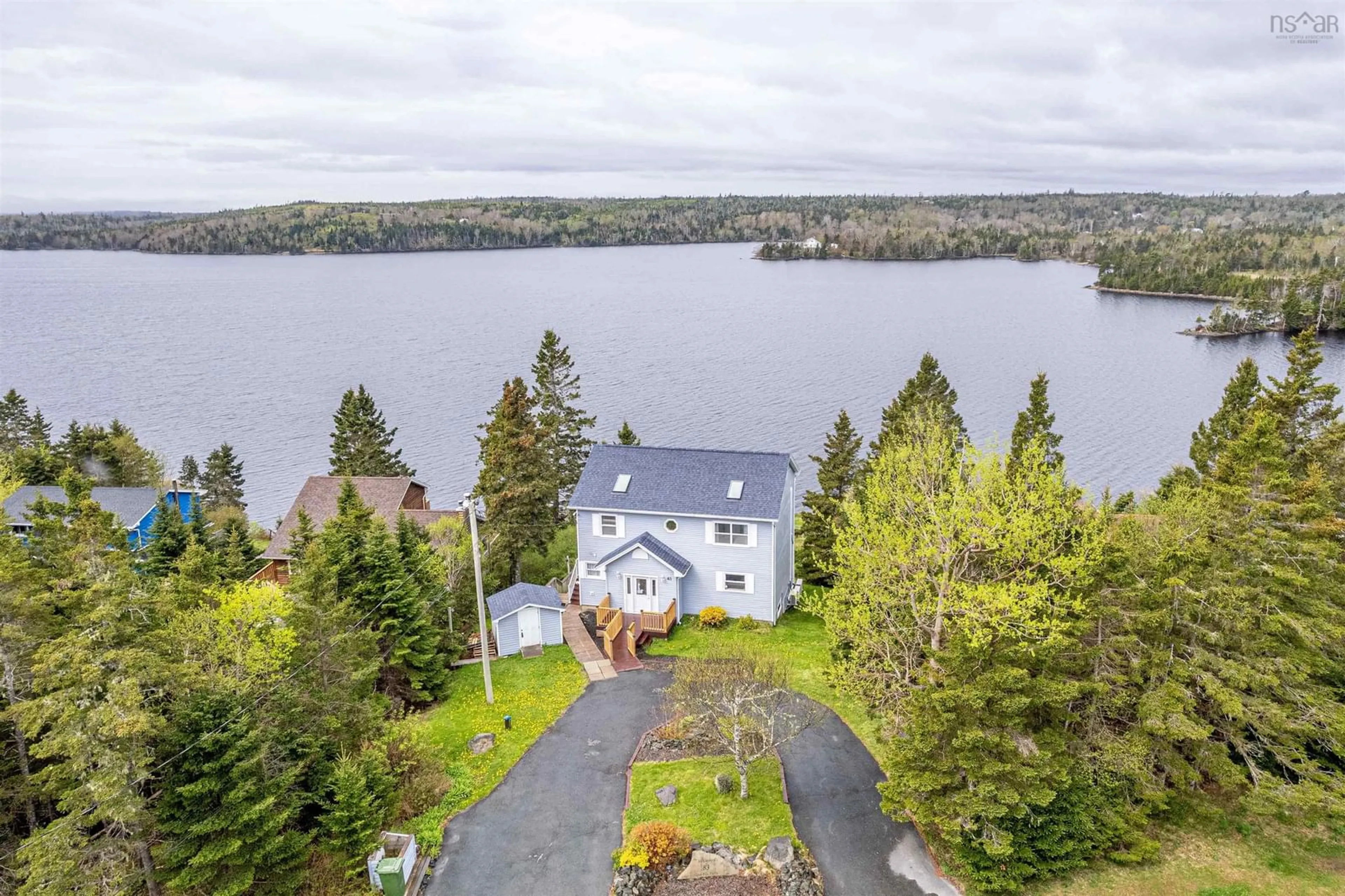 A pic from outside/outdoor area/front of a property/back of a property/a pic from drone, water/lake/river/ocean view for 83 Candy Mountain Rd, Lawrencetown Nova Scotia B2Z 1K4