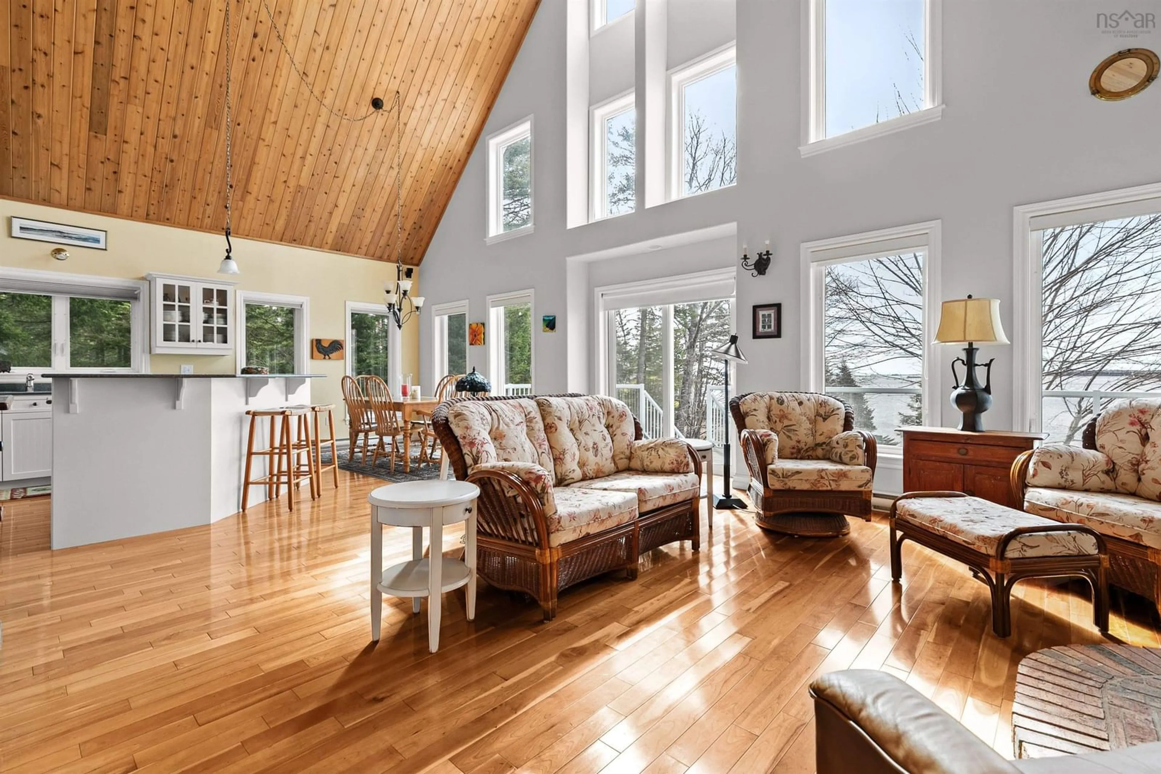 Living room with furniture, wood/laminate floor for 135 Borgalds Shore Dr, Chester Basin Nova Scotia B0J 1K0