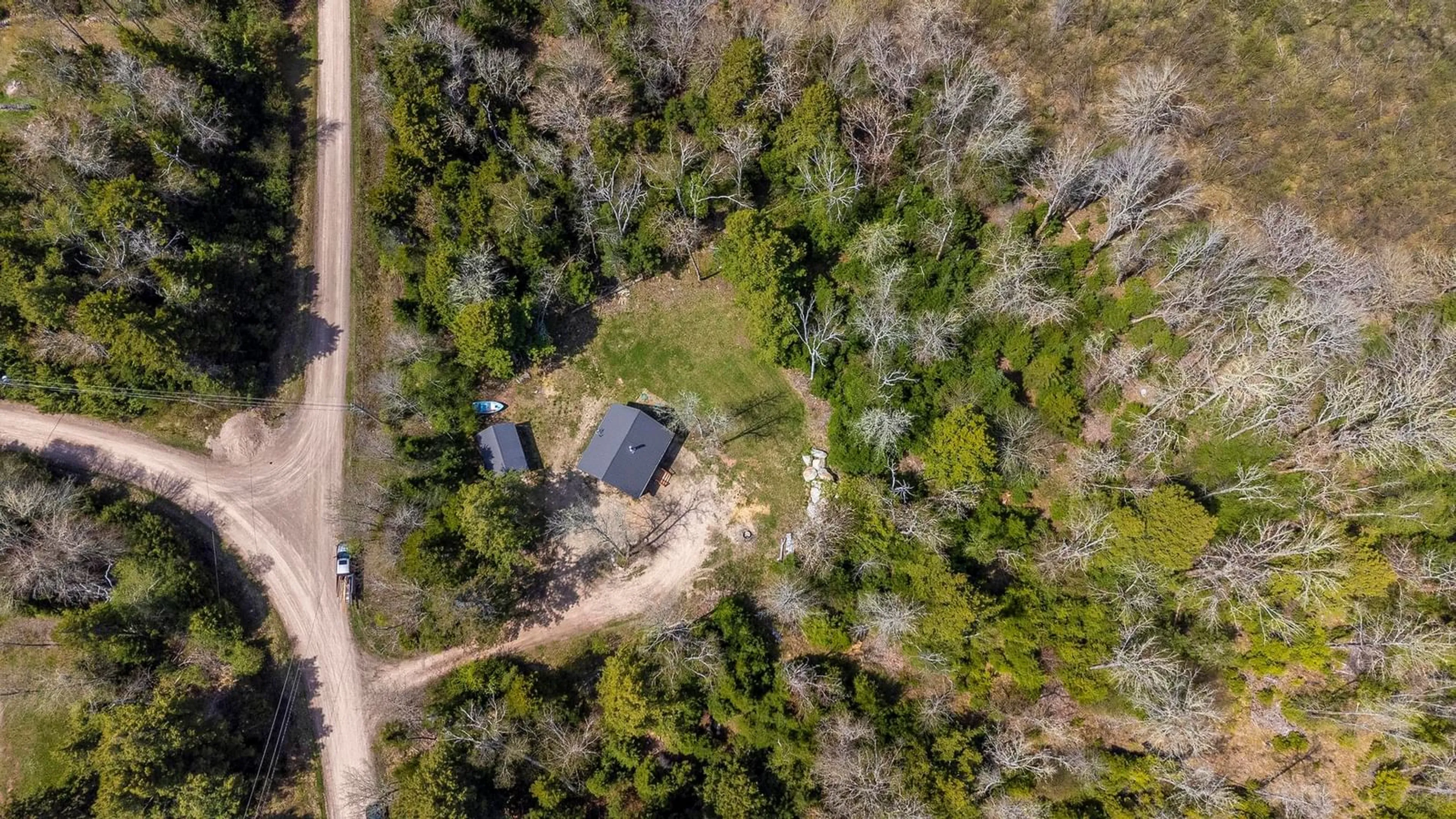 A pic from outside/outdoor area/front of a property/back of a property/a pic from drone, forest/trees view for 81 Crescent Point Rd, Springfield Nova Scotia B0R 1H0