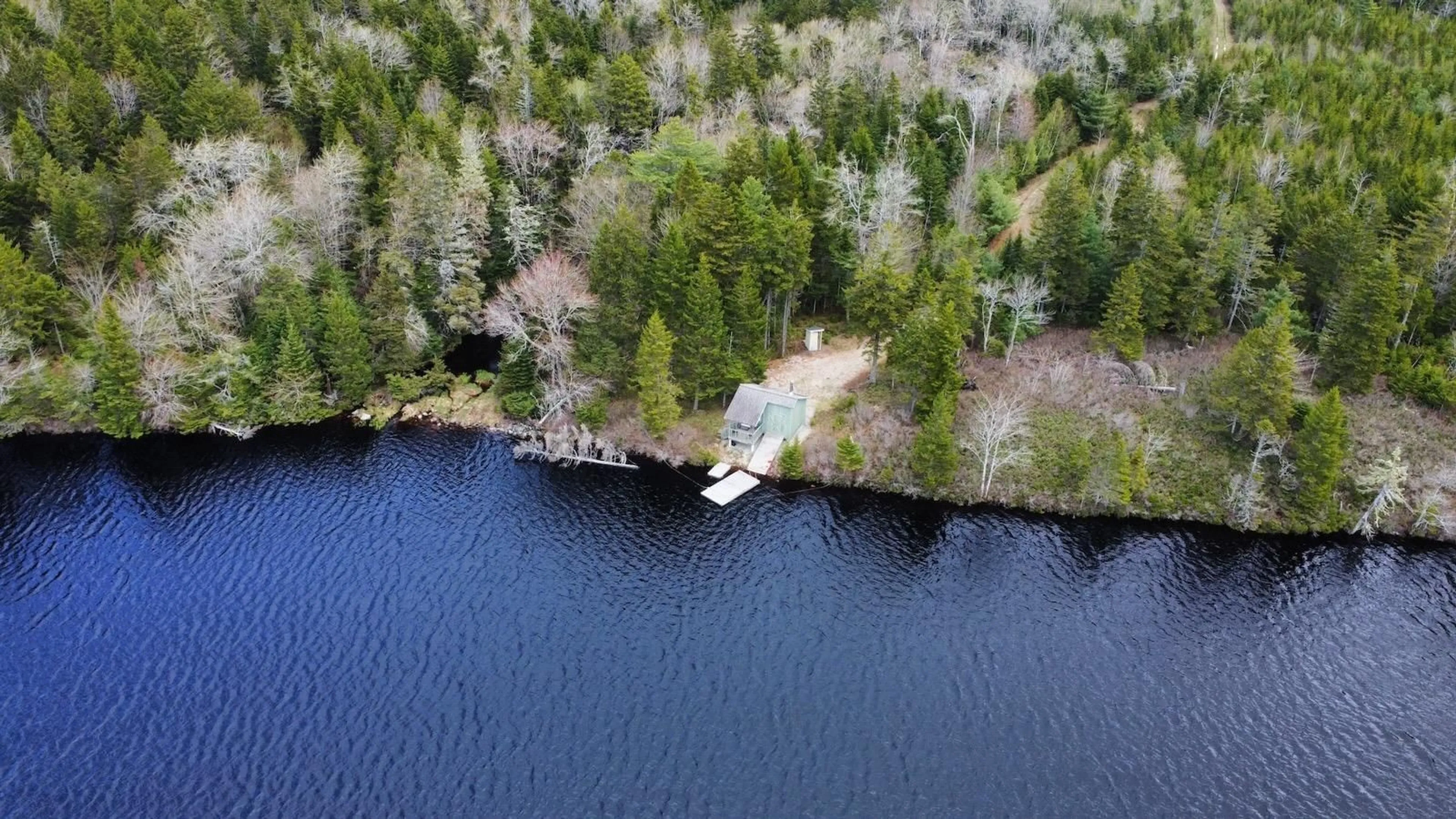 A pic from outside/outdoor area/front of a property/back of a property/a pic from drone, water/lake/river/ocean view for 4113 340 Hwy, Carleton Nova Scotia B5A 5N9