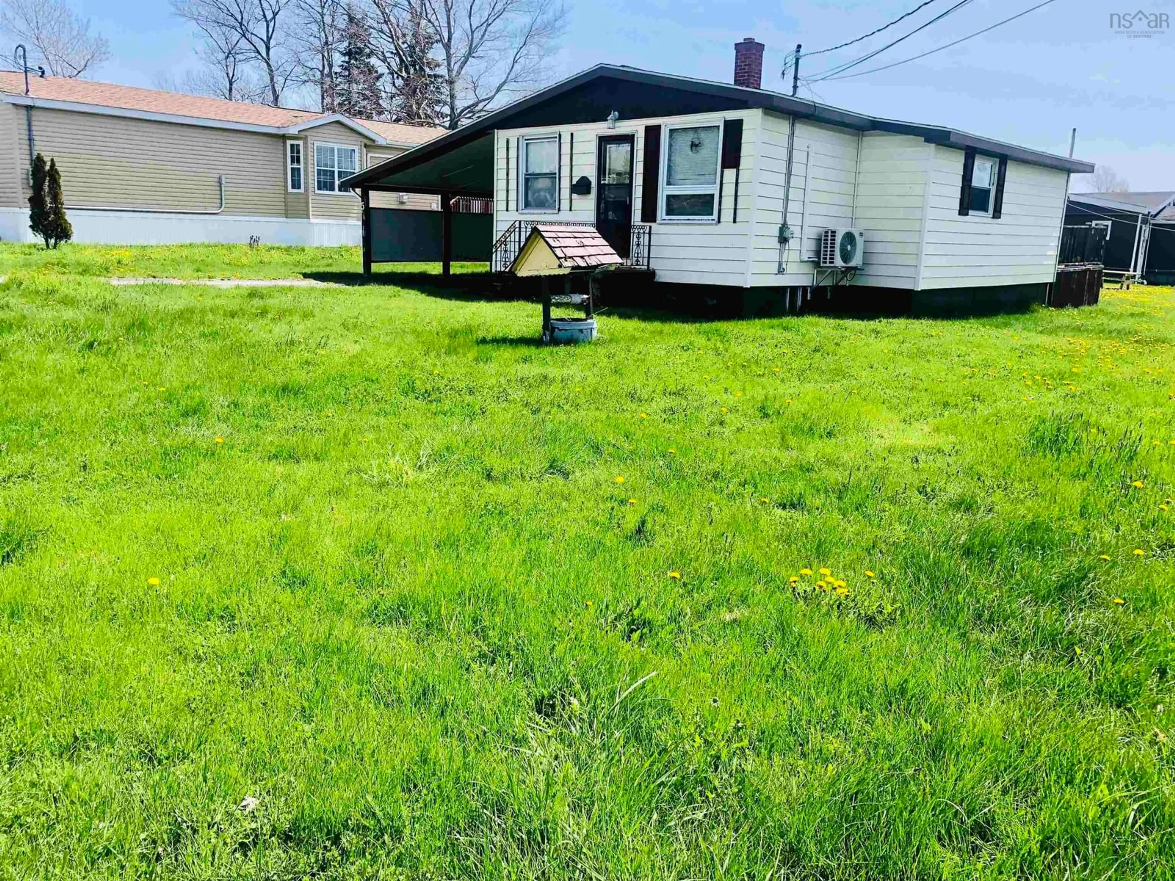 A pic from outside/outdoor area/front of a property/back of a property/a pic from drone, street for 5 Bugden St, Sydney Mines Nova Scotia B1V 1Z8