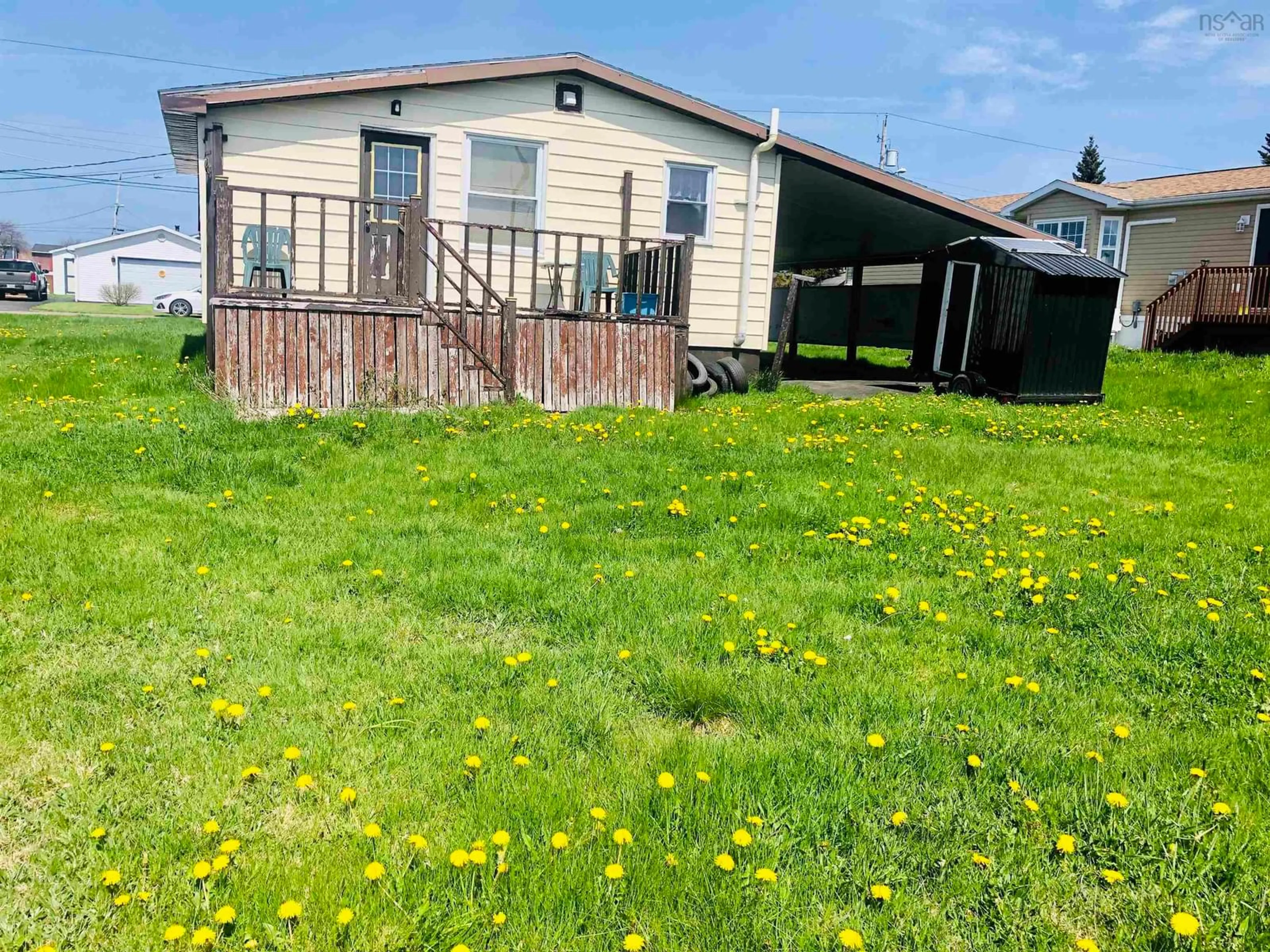 A pic from outside/outdoor area/front of a property/back of a property/a pic from drone, unknown for 5 Bugden St, Sydney Mines Nova Scotia B1V 1Z8