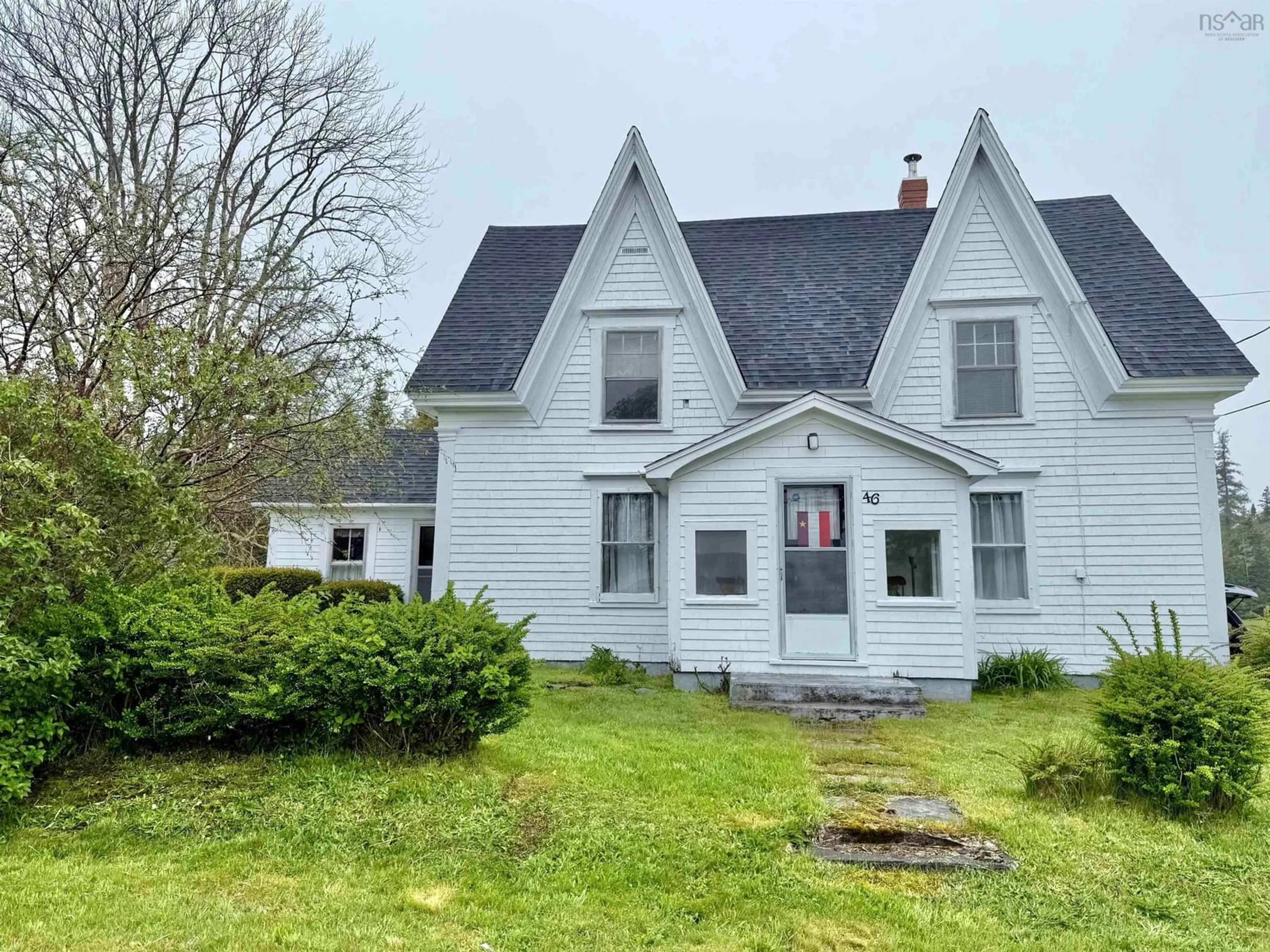 A pic from outside/outdoor area/front of a property/back of a property/a pic from drone, street for 46 Highway 335, Pubnico Nova Scotia B0W 3S0