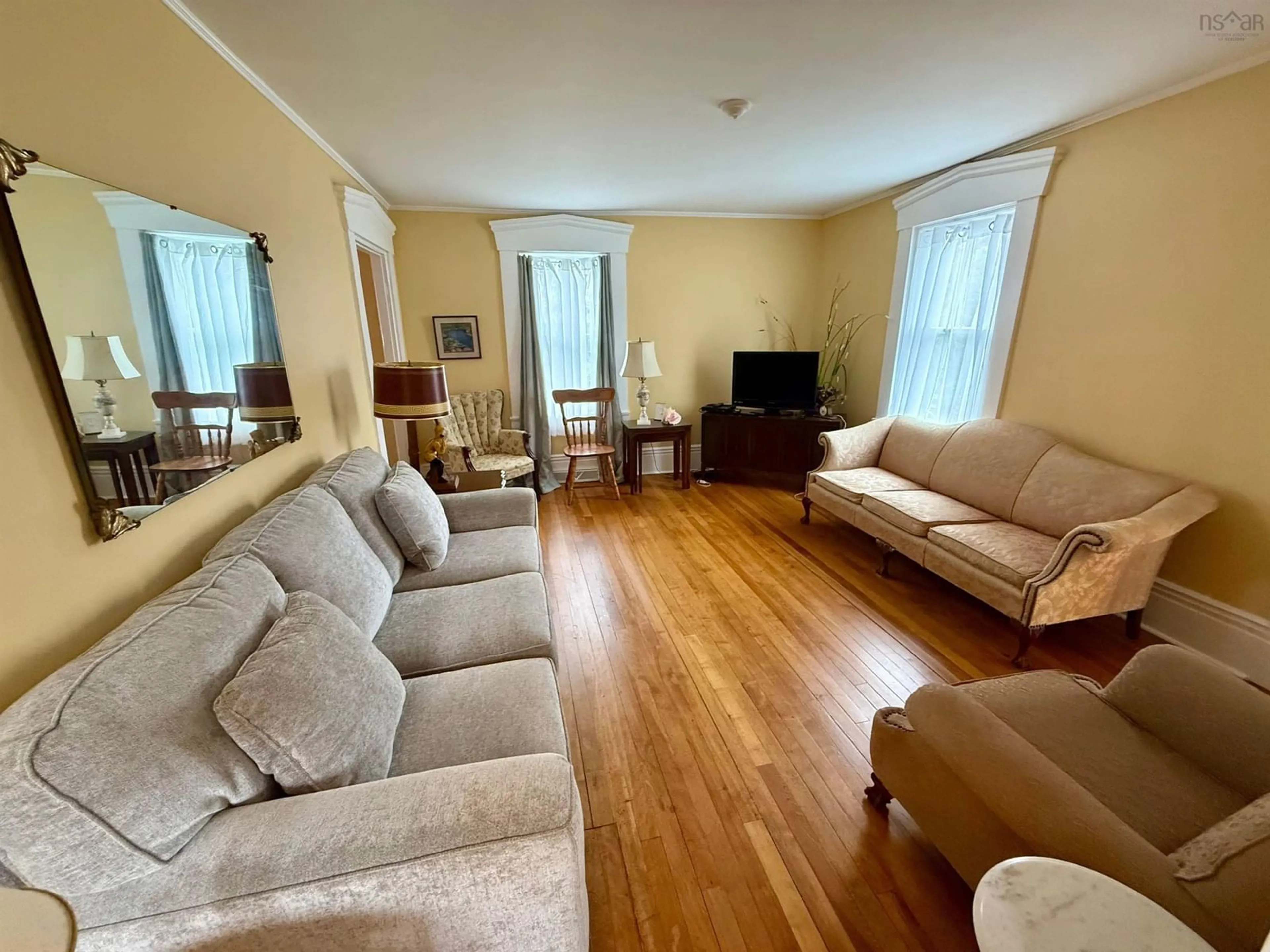 Living room with furniture, unknown for 46 Highway 335, Pubnico Nova Scotia B0W 3S0