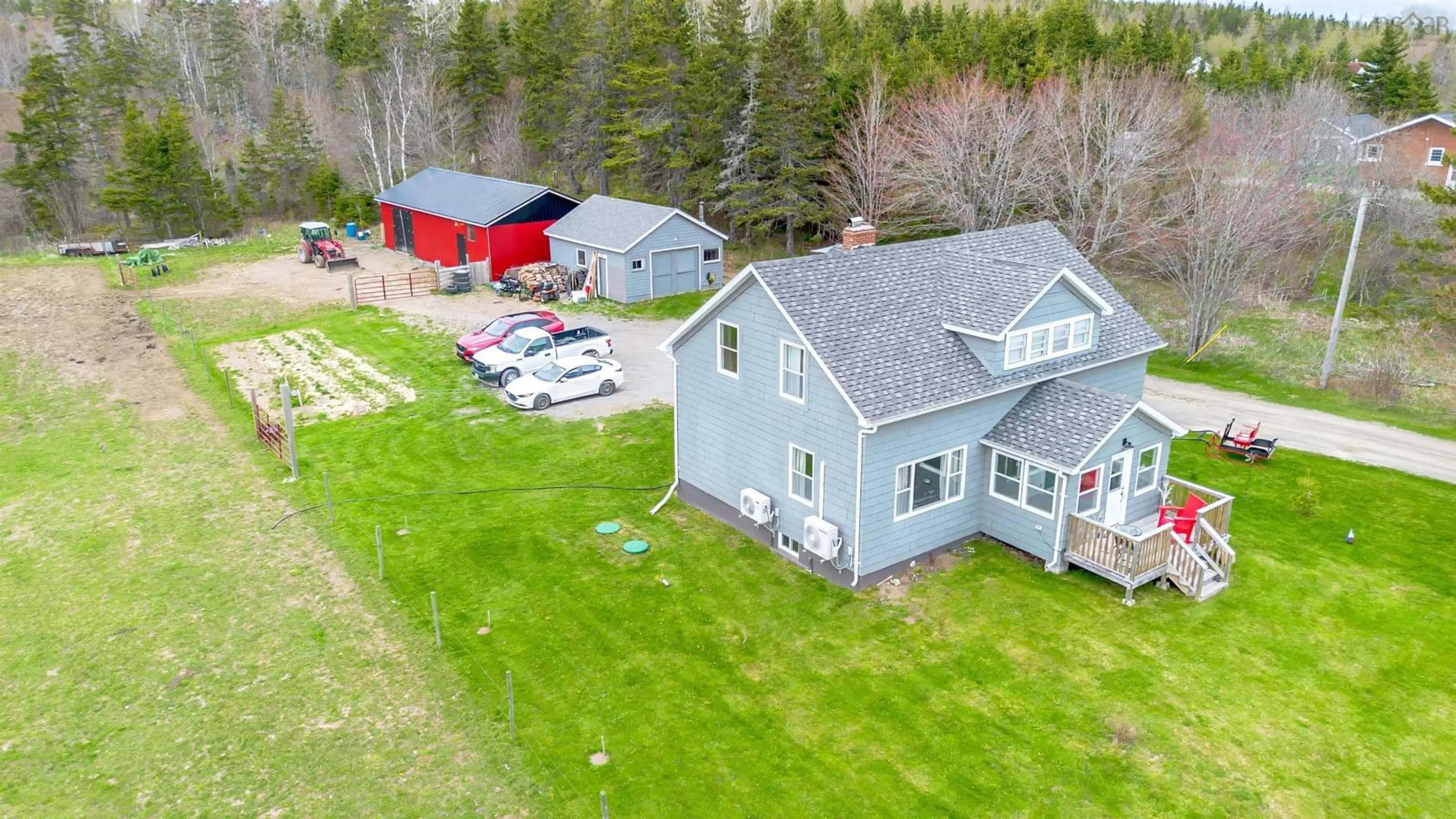 A pic from outside/outdoor area/front of a property/back of a property/a pic from drone, building for 2792 Grand Mira North Rd, Marion Bridge Nova Scotia B1K 1B1