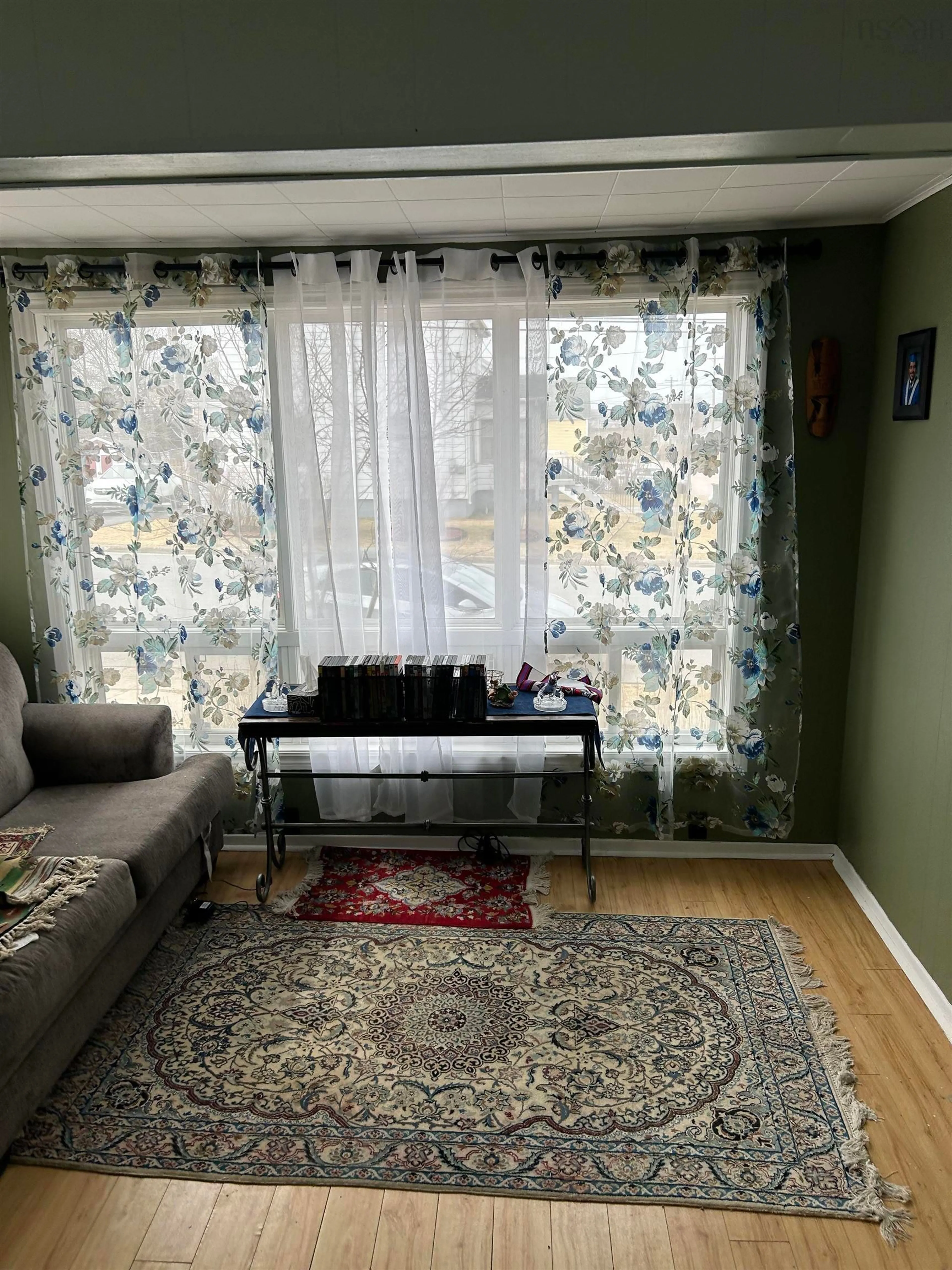 Living room with furniture, unknown for 45 Ashby Rd, Sydney Nova Scotia B1P 2R7