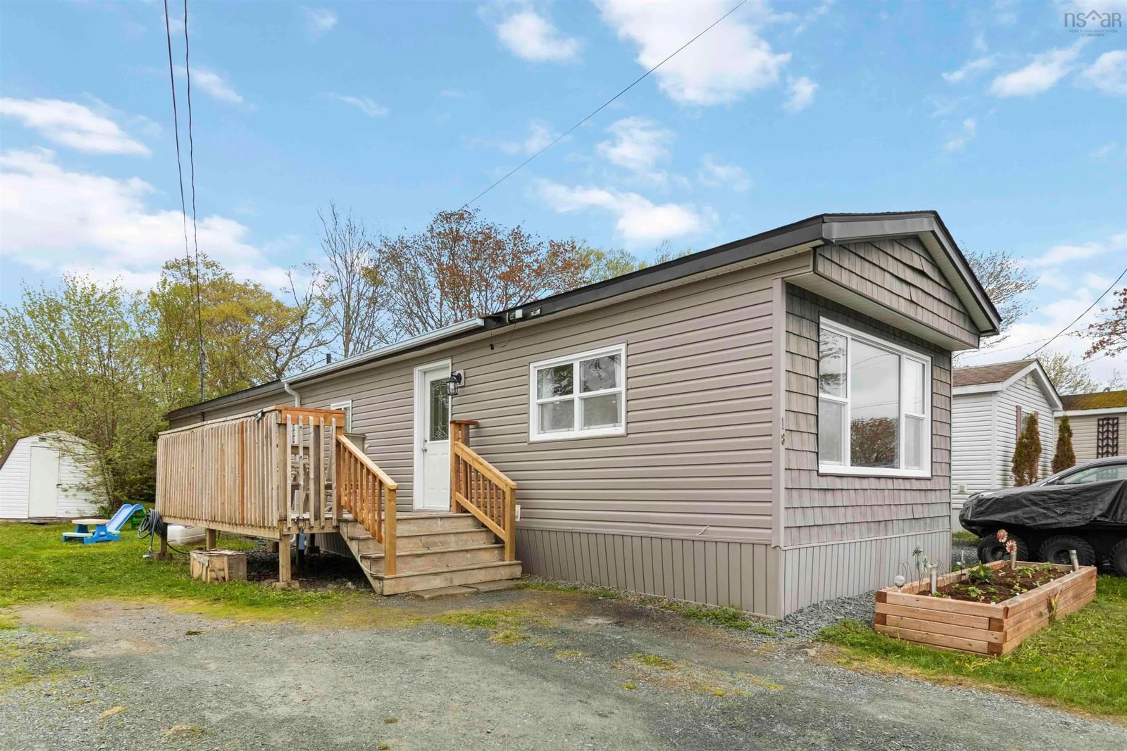 Home with vinyl exterior material, street for 18 Happy Dr, Lake Echo Nova Scotia B3E 1C4