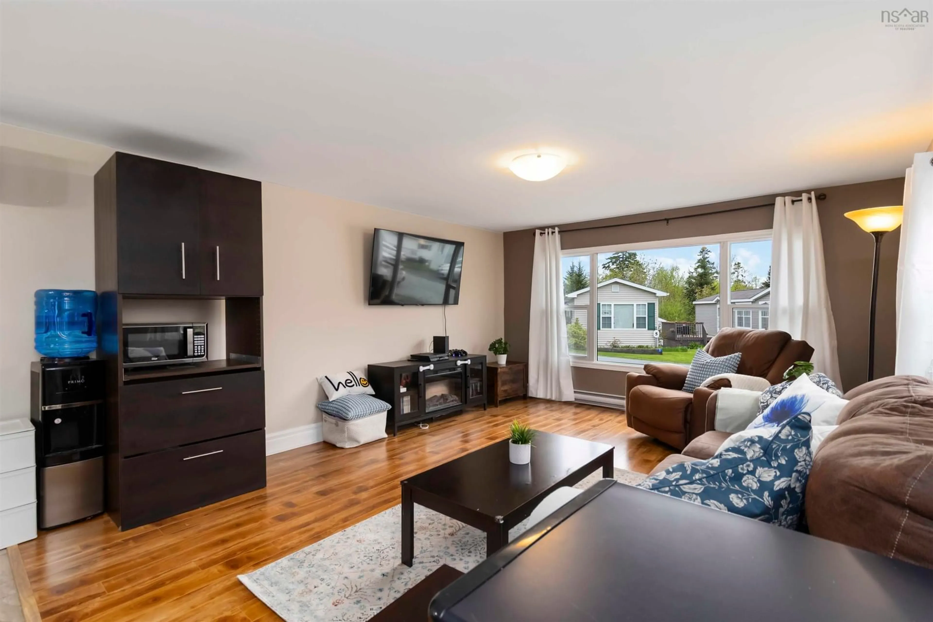 Living room with furniture, wood/laminate floor for 18 Happy Dr, Lake Echo Nova Scotia B3E 1C4