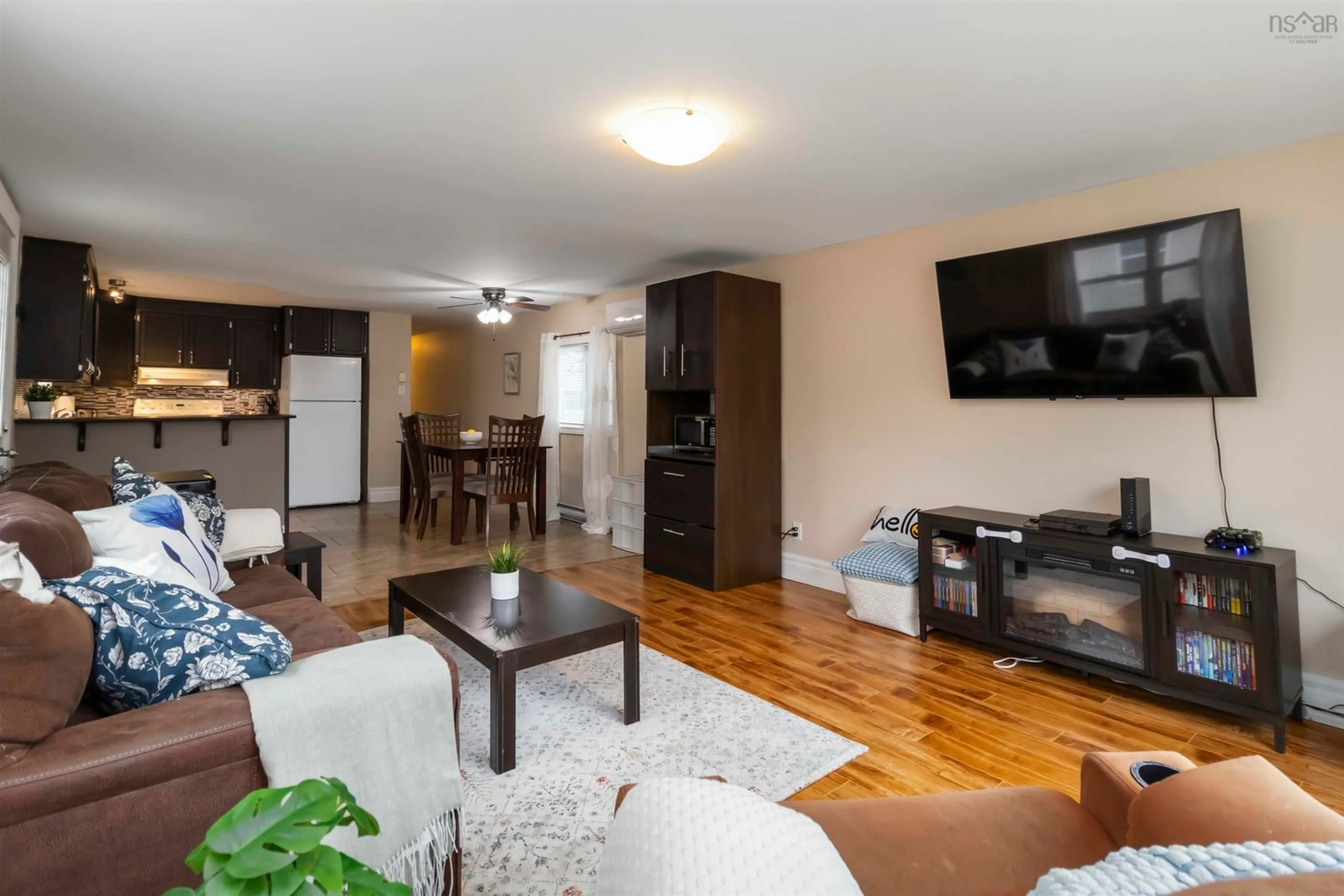 Living room with furniture, wood/laminate floor for 18 Happy Dr, Lake Echo Nova Scotia B3E 1C4