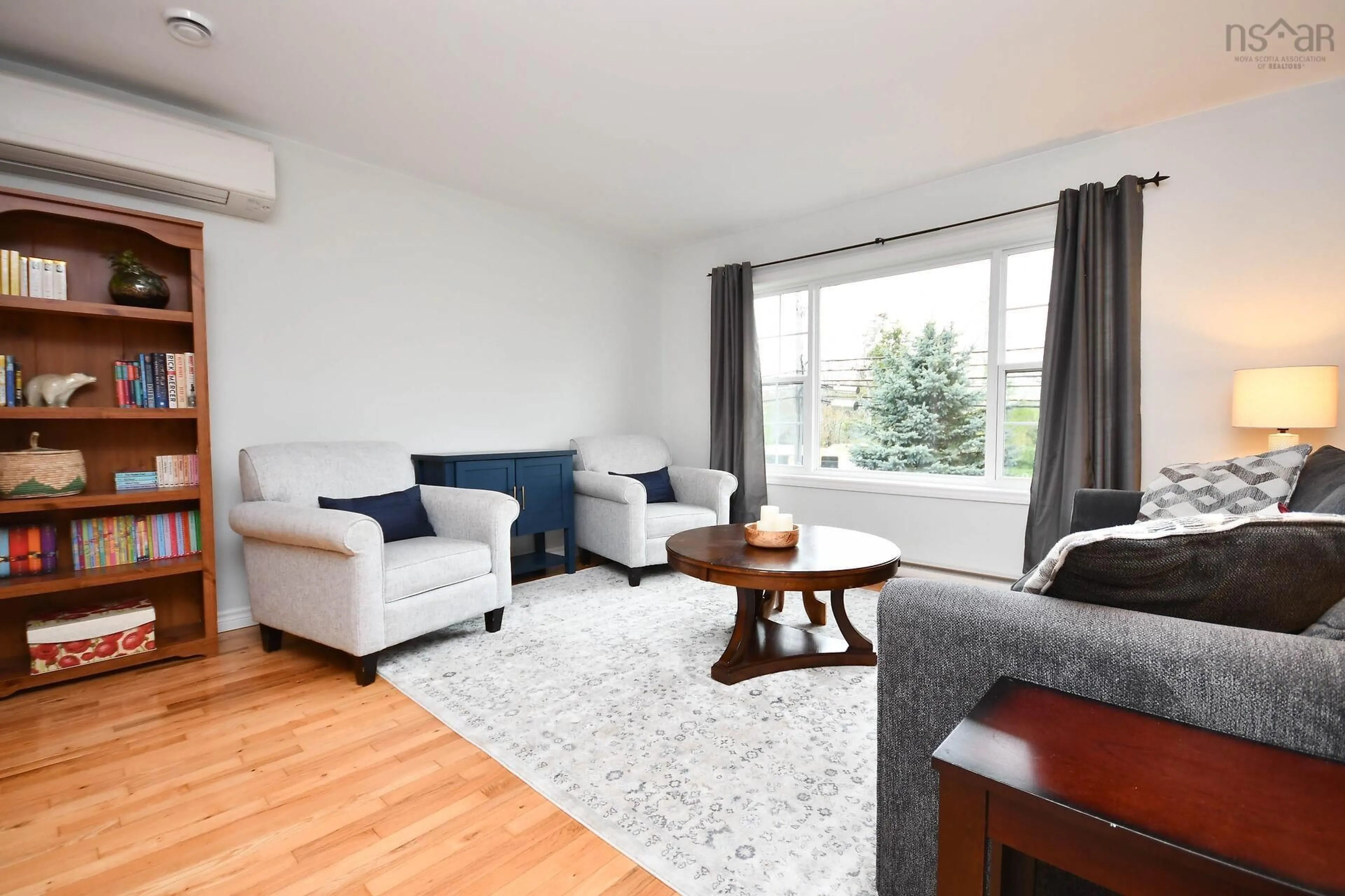 Living room with furniture, wood/laminate floor for 209 Beaver Bank Rd, Beaver Bank Nova Scotia B4E 1J8