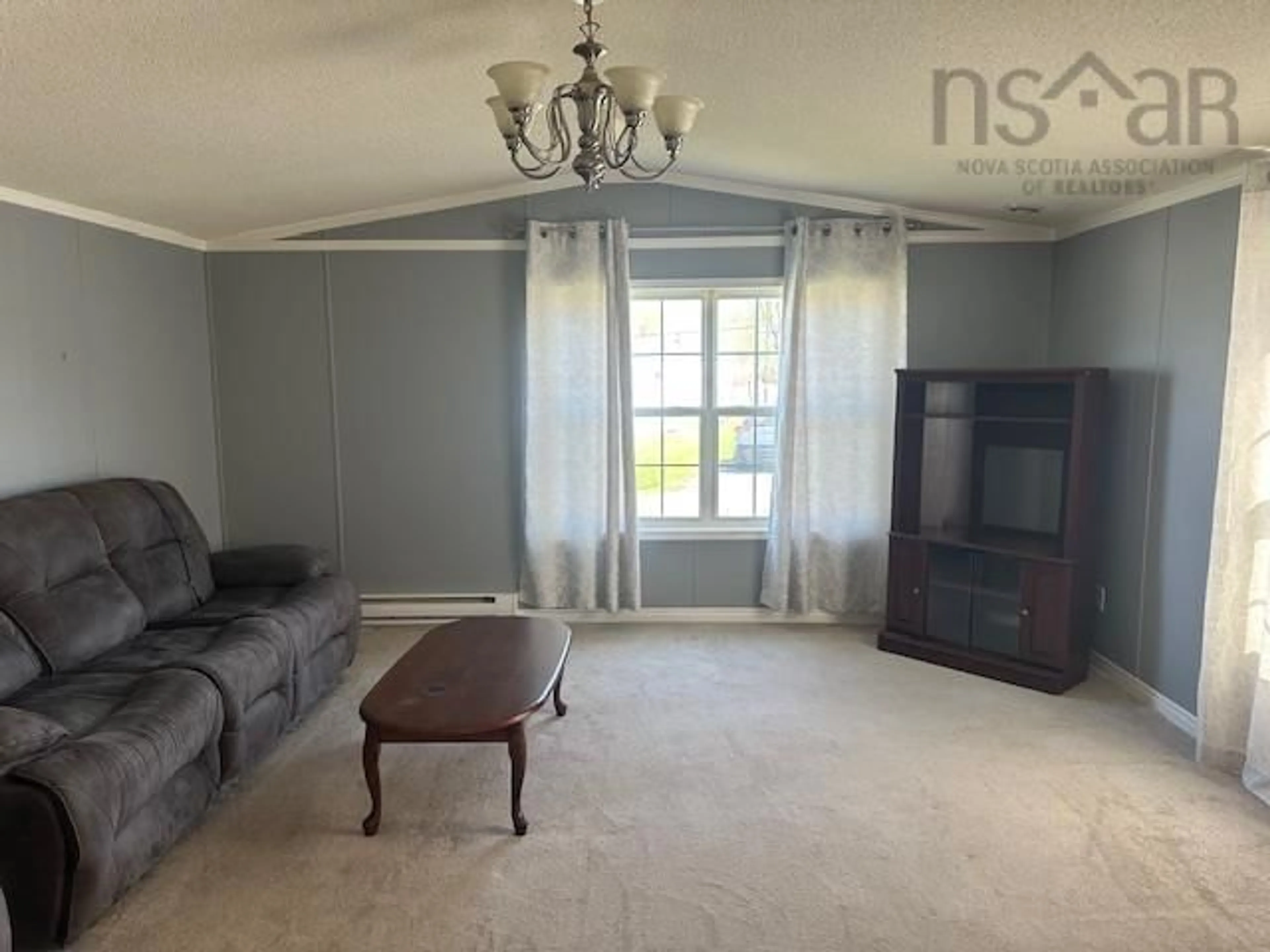 Living room with furniture, unknown for 21 High Street Estate, New Glasgow Nova Scotia B2H 4B9