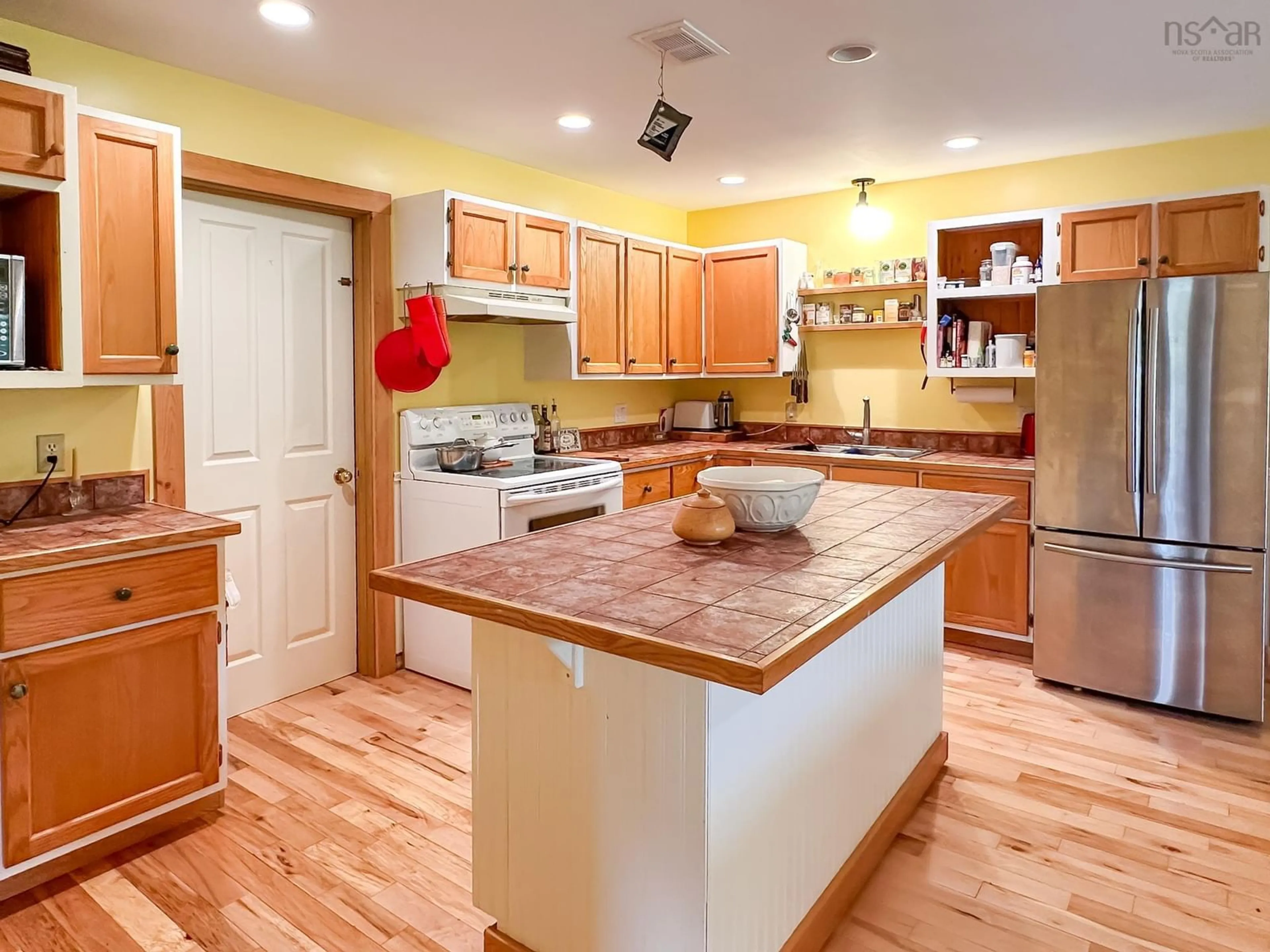 Open concept kitchen, wood/laminate floor for 124 West Black Rock Rd, West Black Rock Nova Scotia B0P 1V0