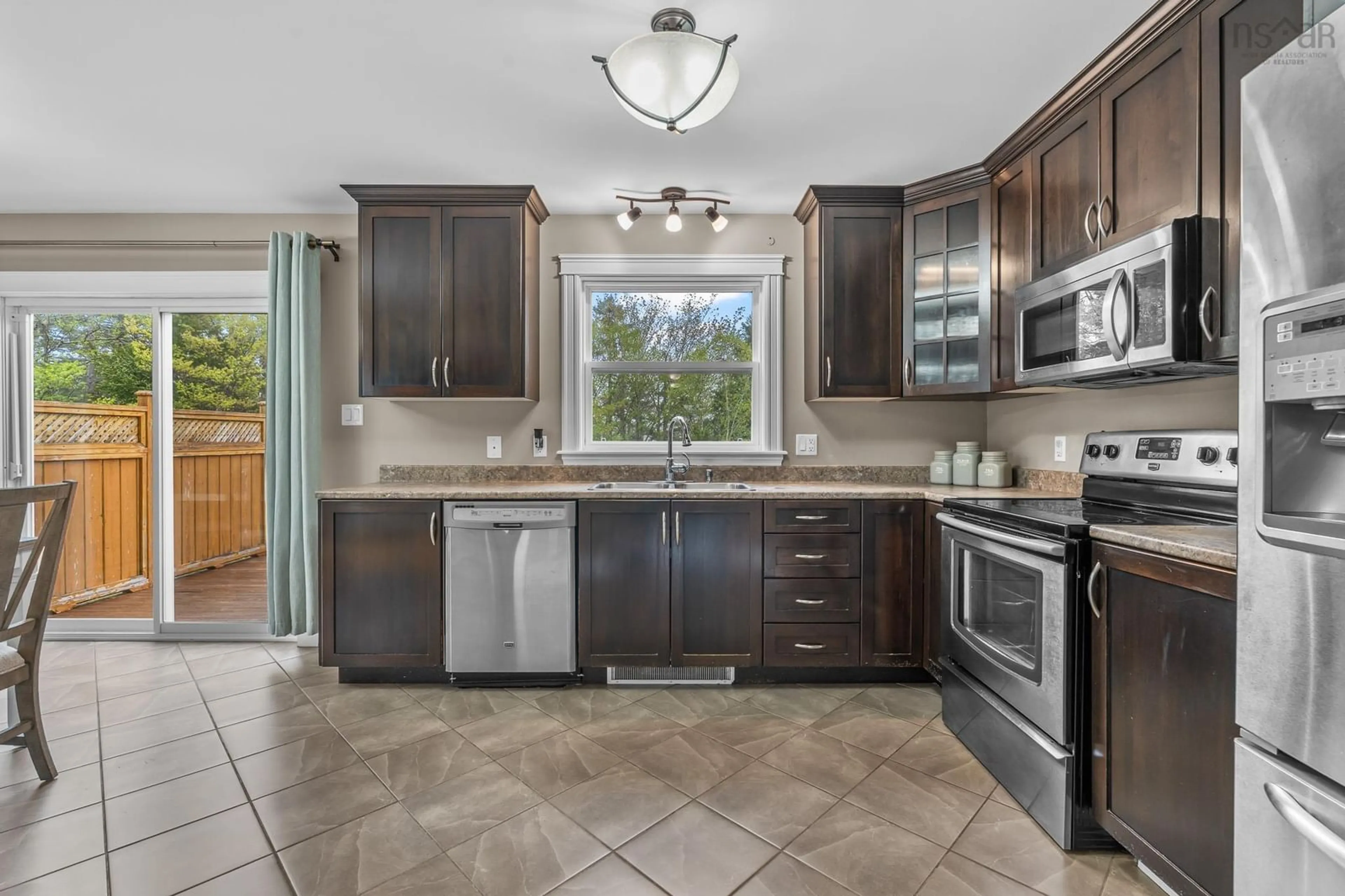 Open concept kitchen, ceramic/tile floor for 75 Avebury Crt, Middle Sackville Nova Scotia B4E 0E9