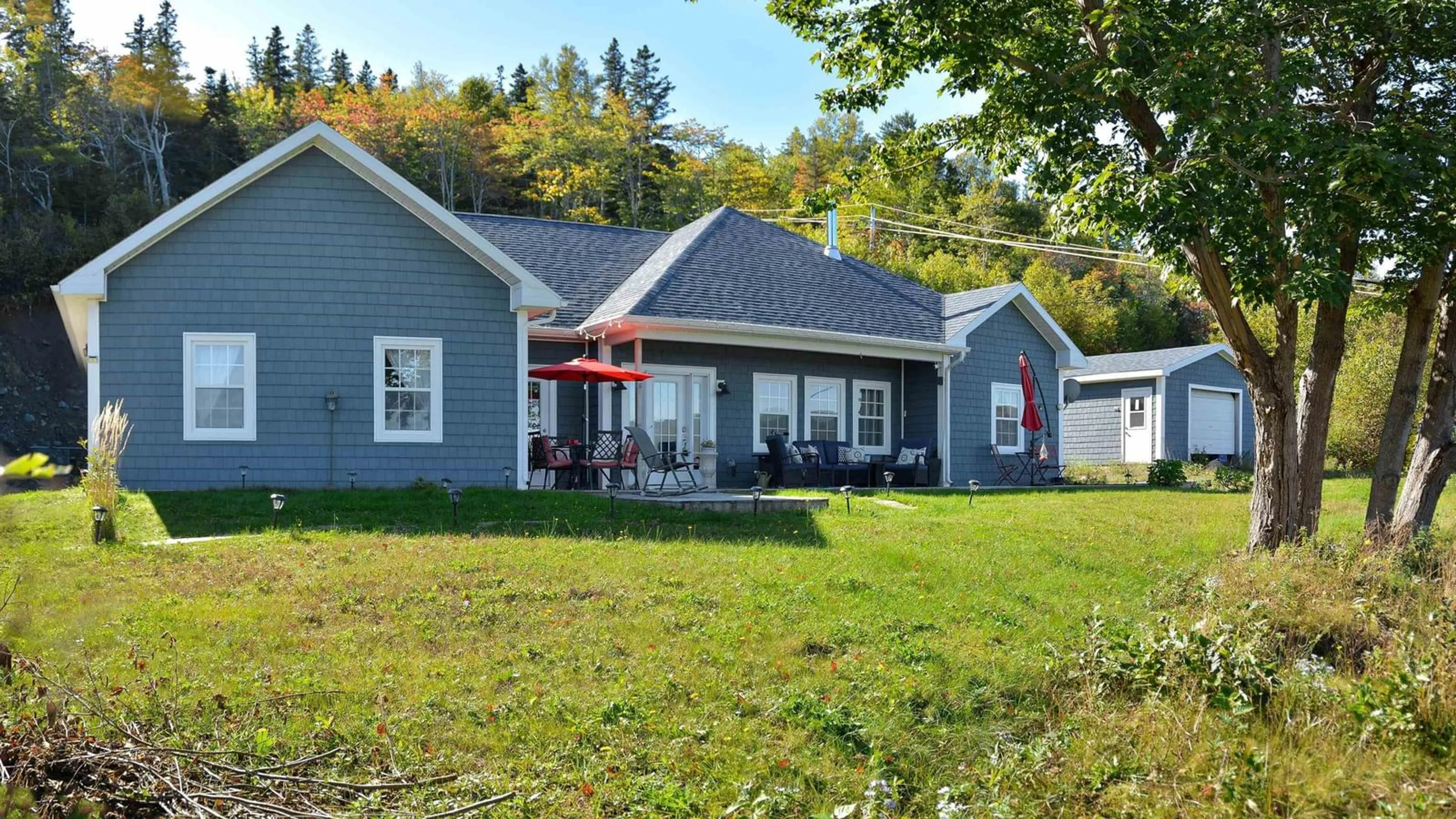 Patio, water/lake/river/ocean view for 39170 Cabot Trail Rd, Ingonish Nova Scotia B0C 1L0