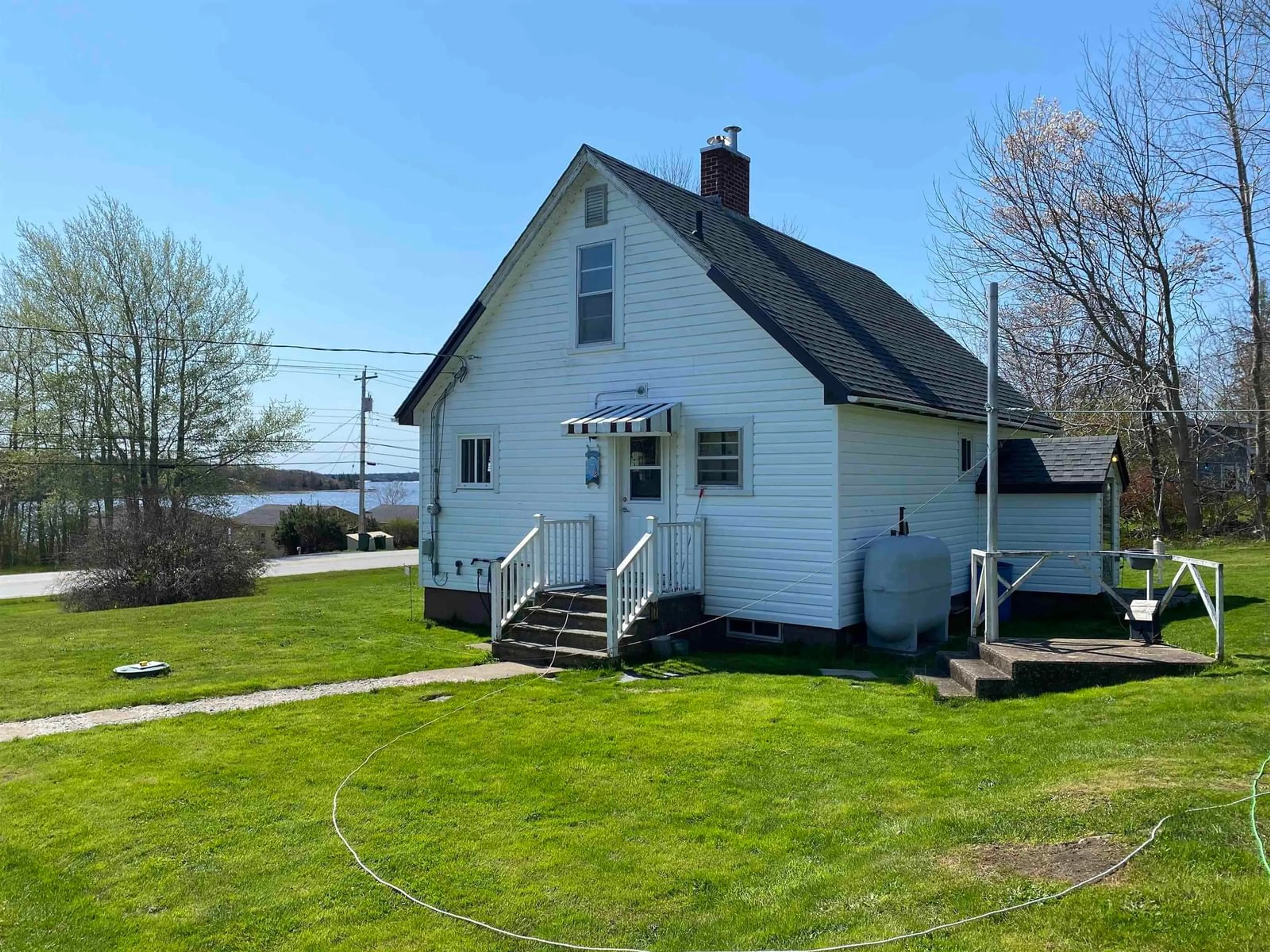 A pic from outside/outdoor area/front of a property/back of a property/a pic from drone, water/lake/river/ocean view for 8394 Highway 3, Port Mouton Nova Scotia B0T 1T0