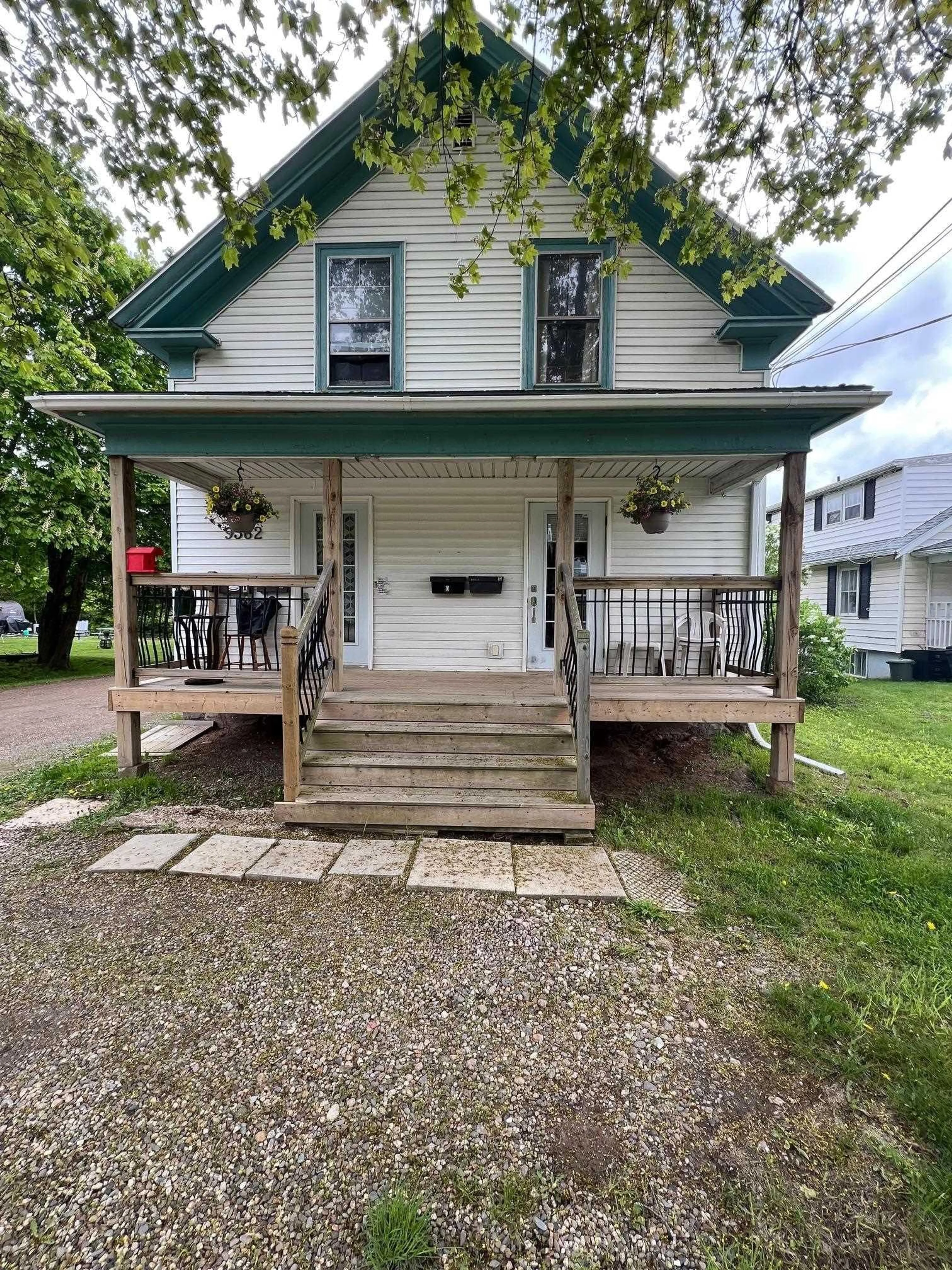 Home with vinyl exterior material, street for 9362 Commercial St, New Minas Nova Scotia B4N 3E9