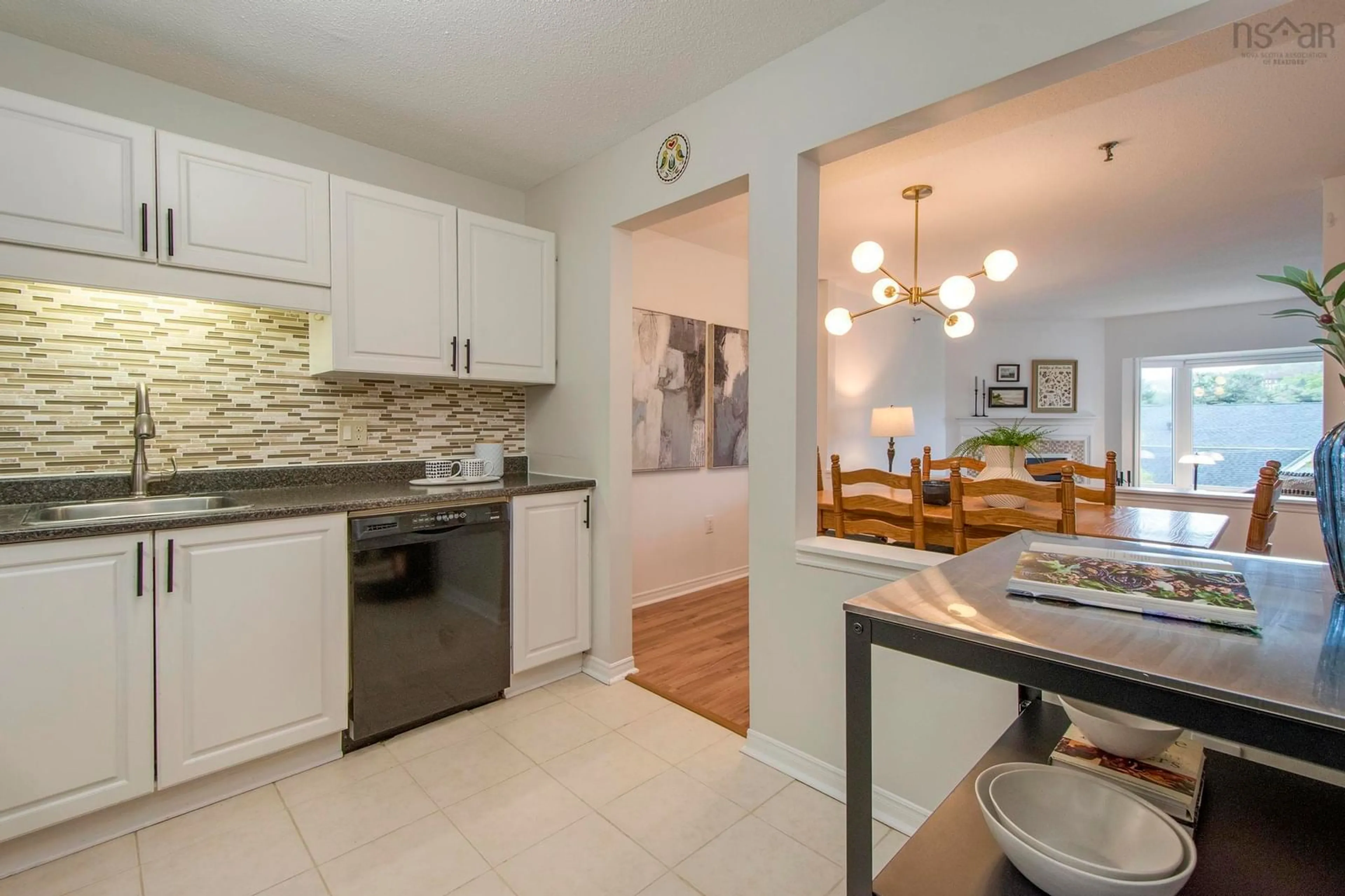 Open concept kitchen, ceramic/tile floor for 12 Spinnaker Dr #404, Halifax Nova Scotia B3N 3A8