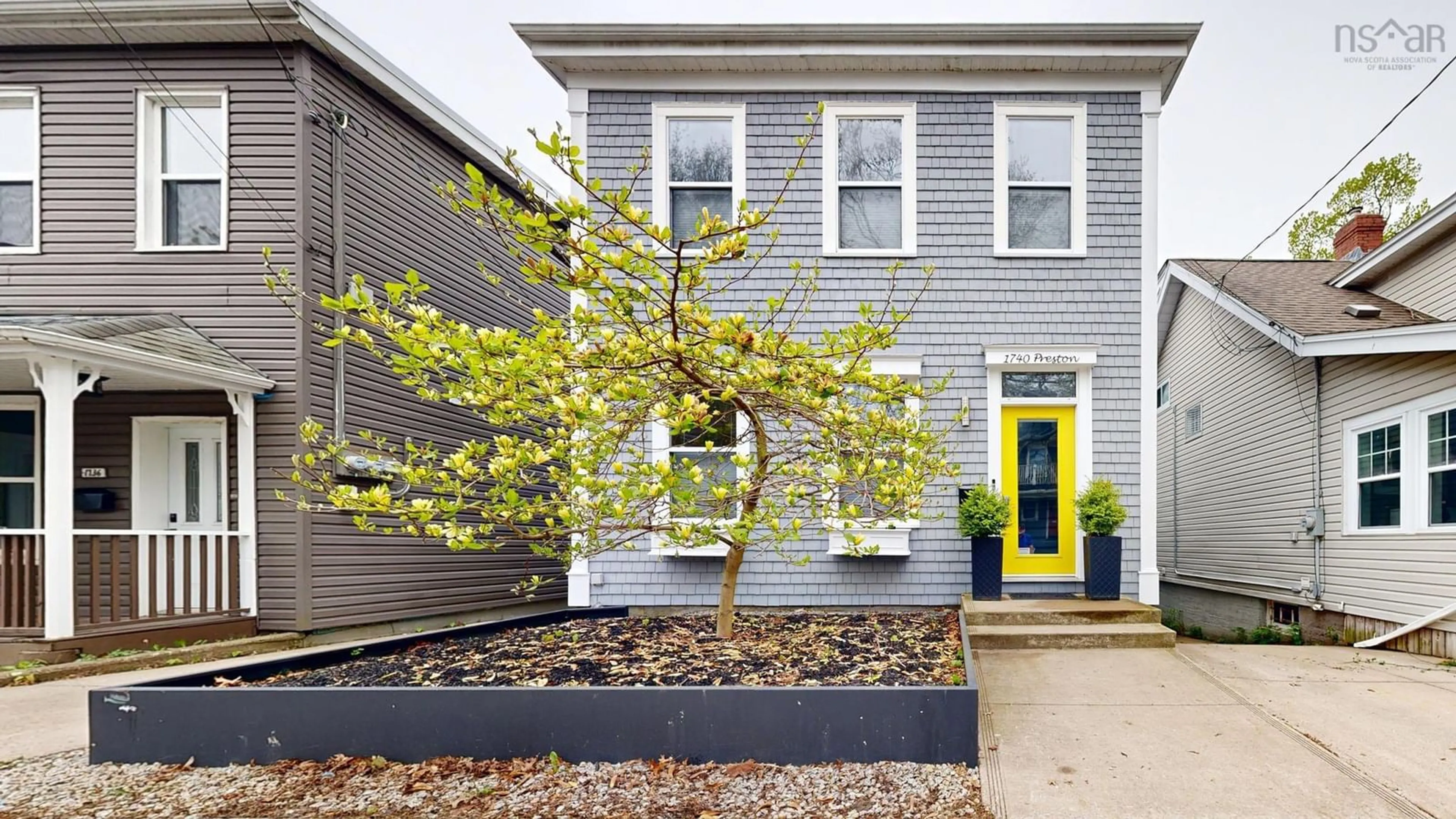 Home with vinyl exterior material, street for 1740 Preston St, Halifax Nova Scotia B3H 3V4
