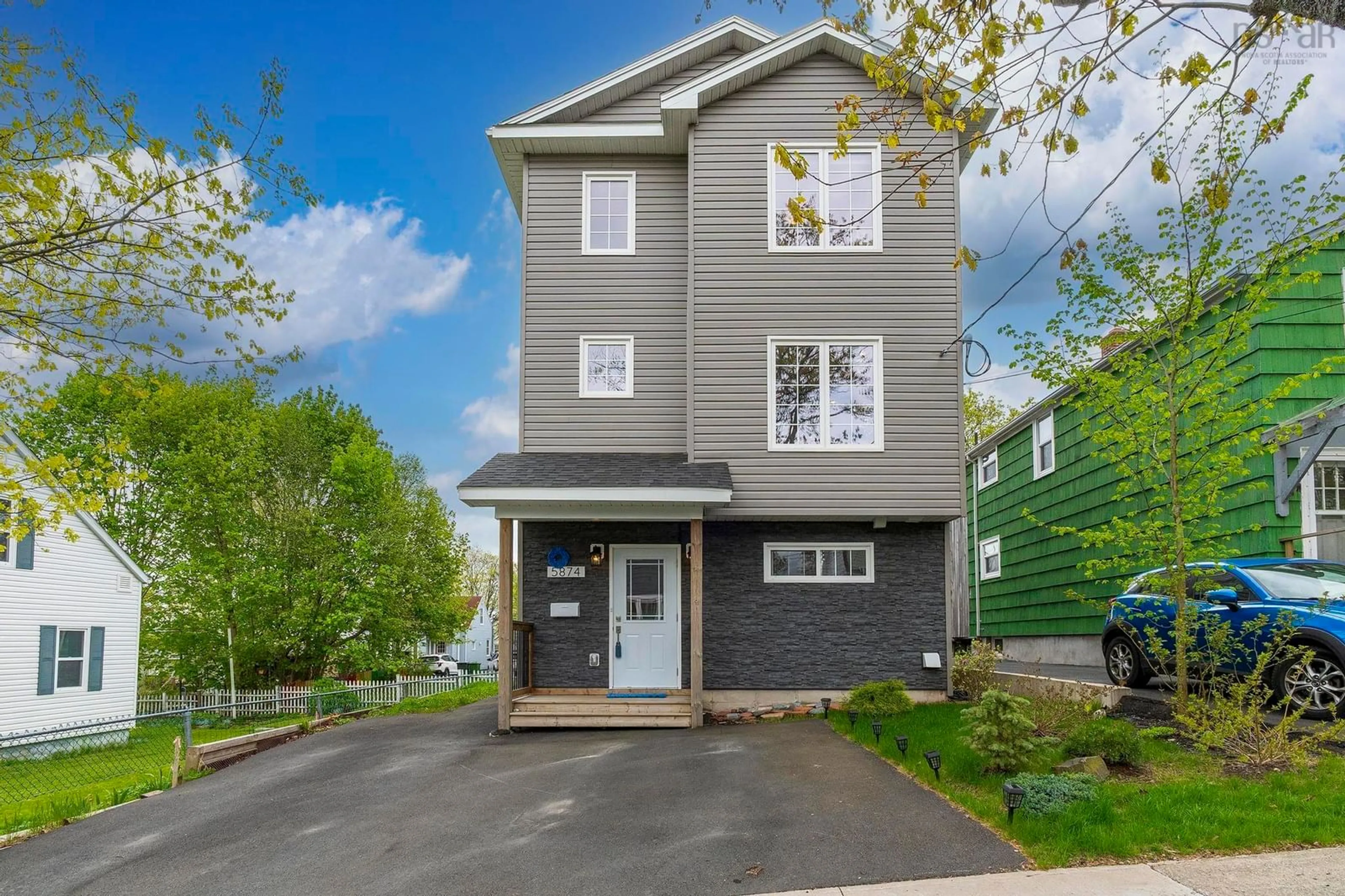 Home with vinyl exterior material, street for 5874 Cabot St, Halifax Nova Scotia B3K 2K1