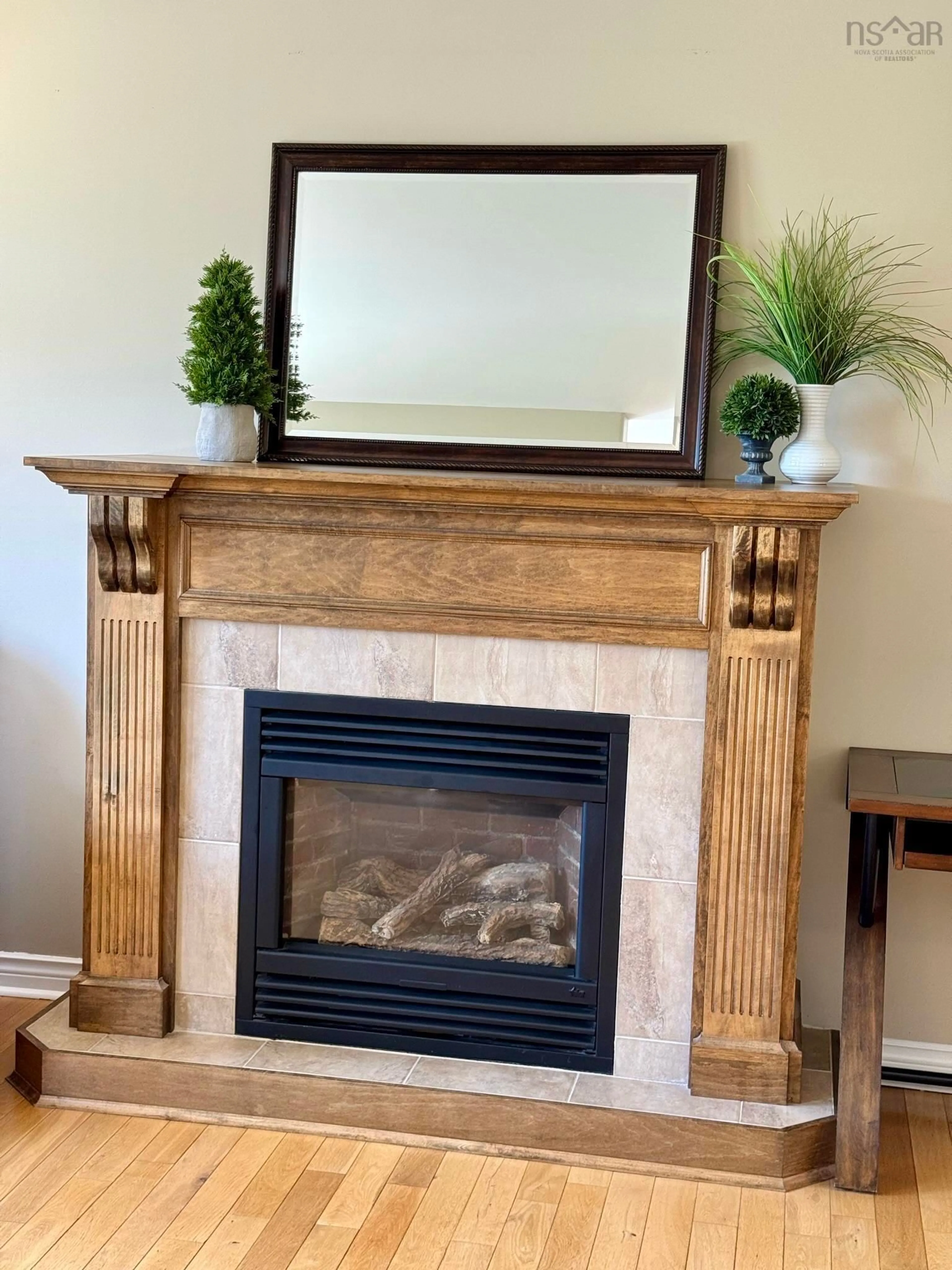 Living room with furniture, wood/laminate floor for 454 Tattenham Cres, Hammonds Plains Nova Scotia B4B 1V3