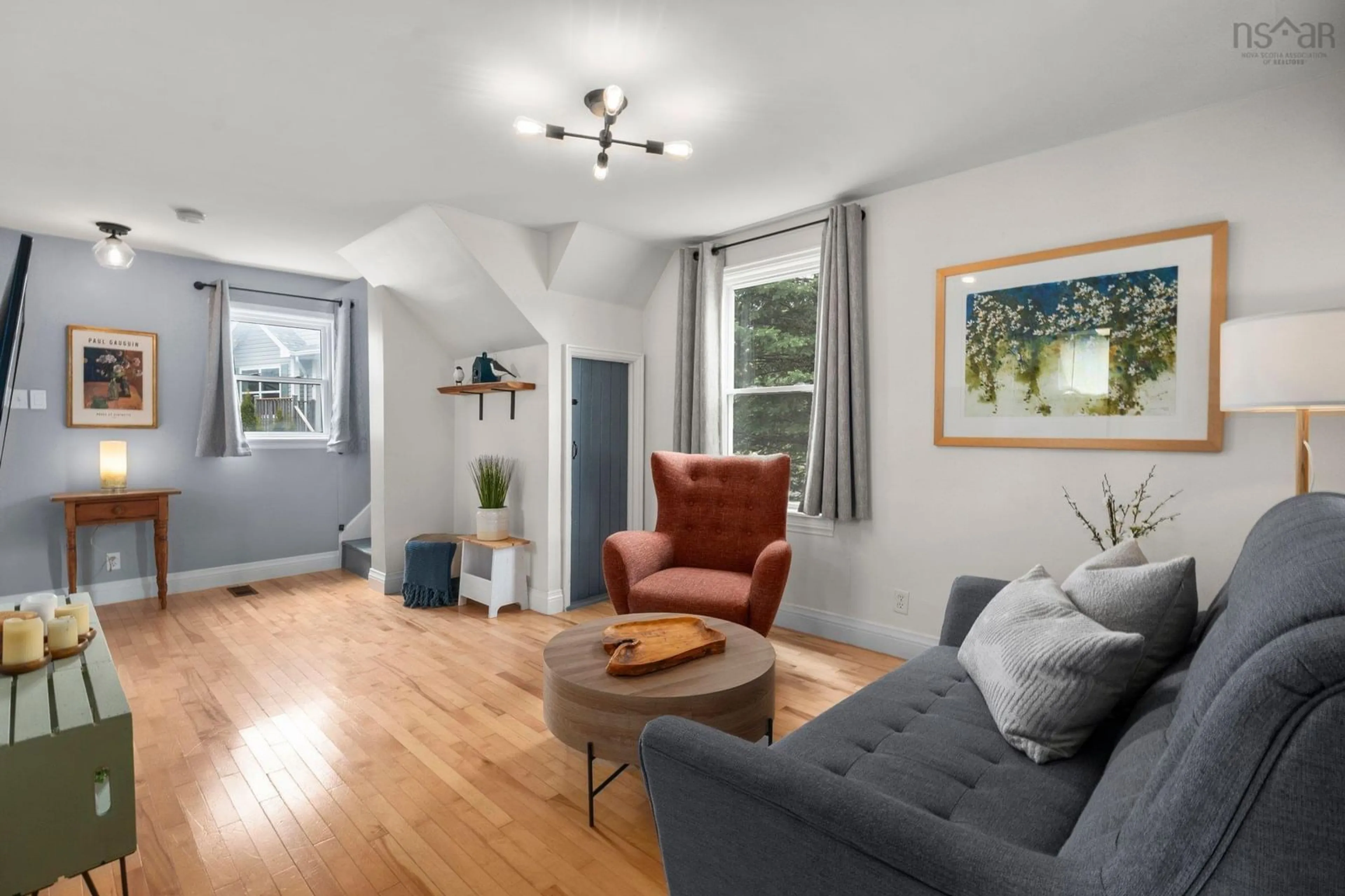 Living room with furniture, wood/laminate floor for 1560 St Margarets Bay Rd, Lakeside Nova Scotia B3T 1A9