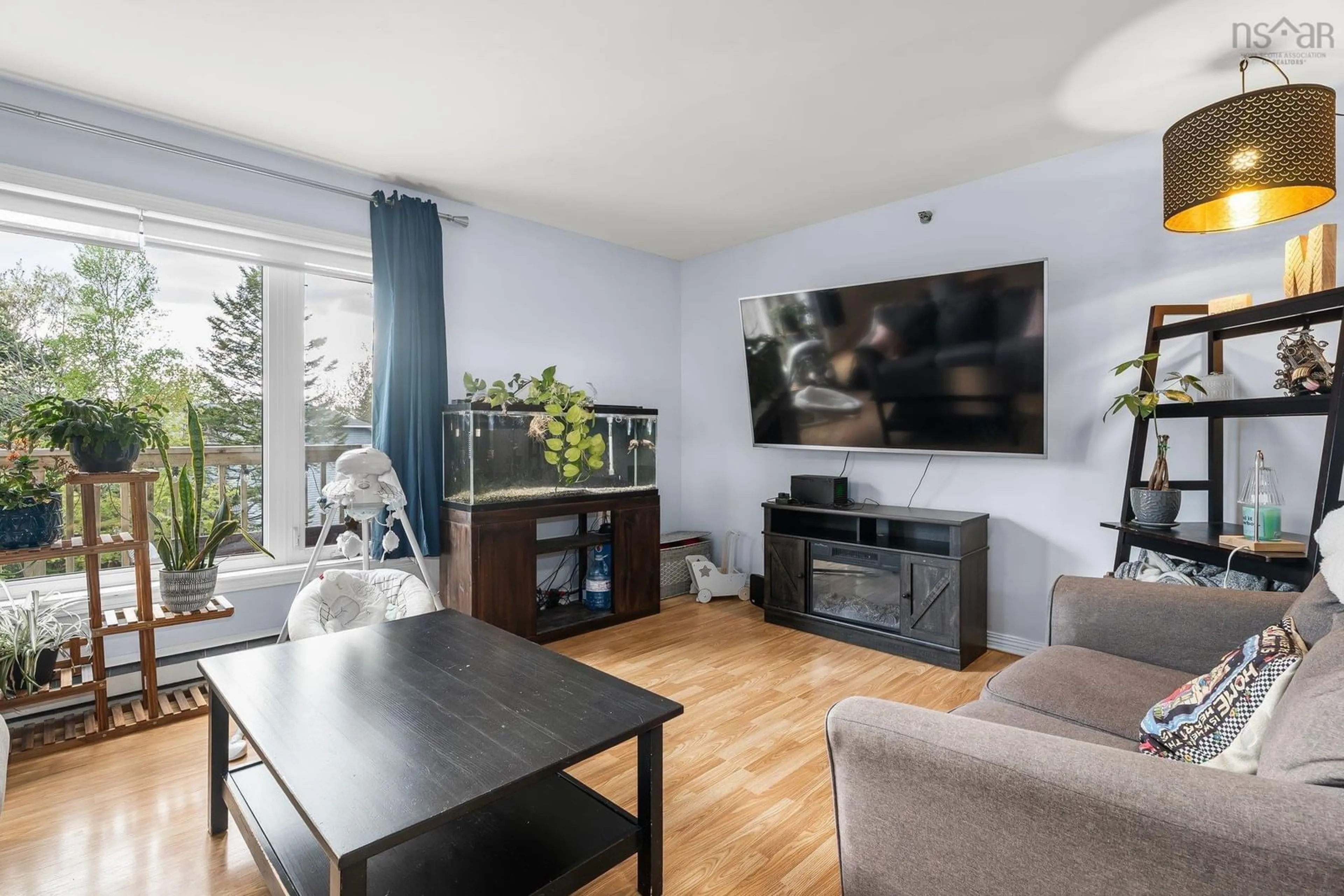 Living room with furniture, wood/laminate floor for 203 Ross St #205, Halifax Nova Scotia B3M 3Z2