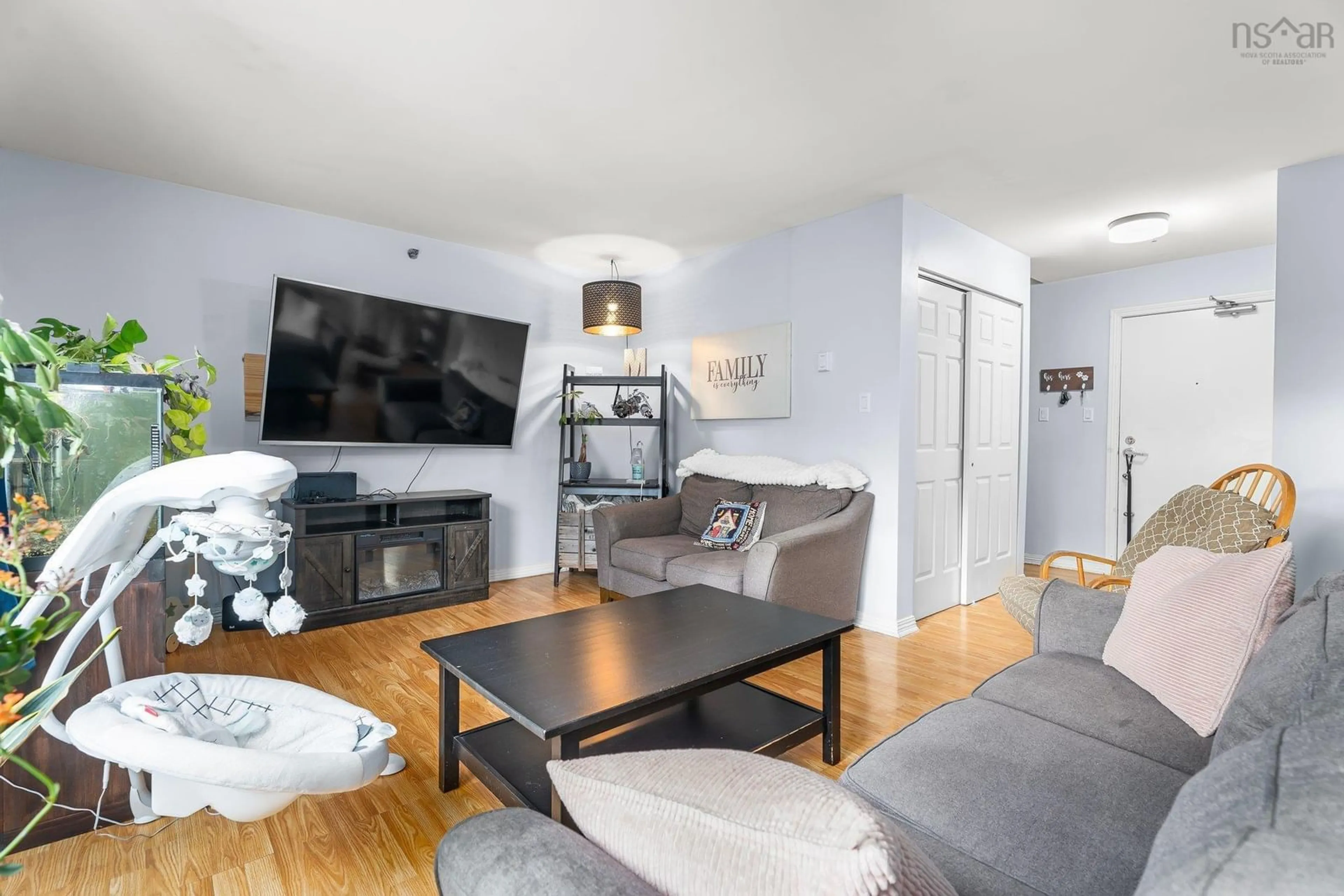 Living room with furniture, wood/laminate floor for 203 Ross St #205, Halifax Nova Scotia B3M 3Z2
