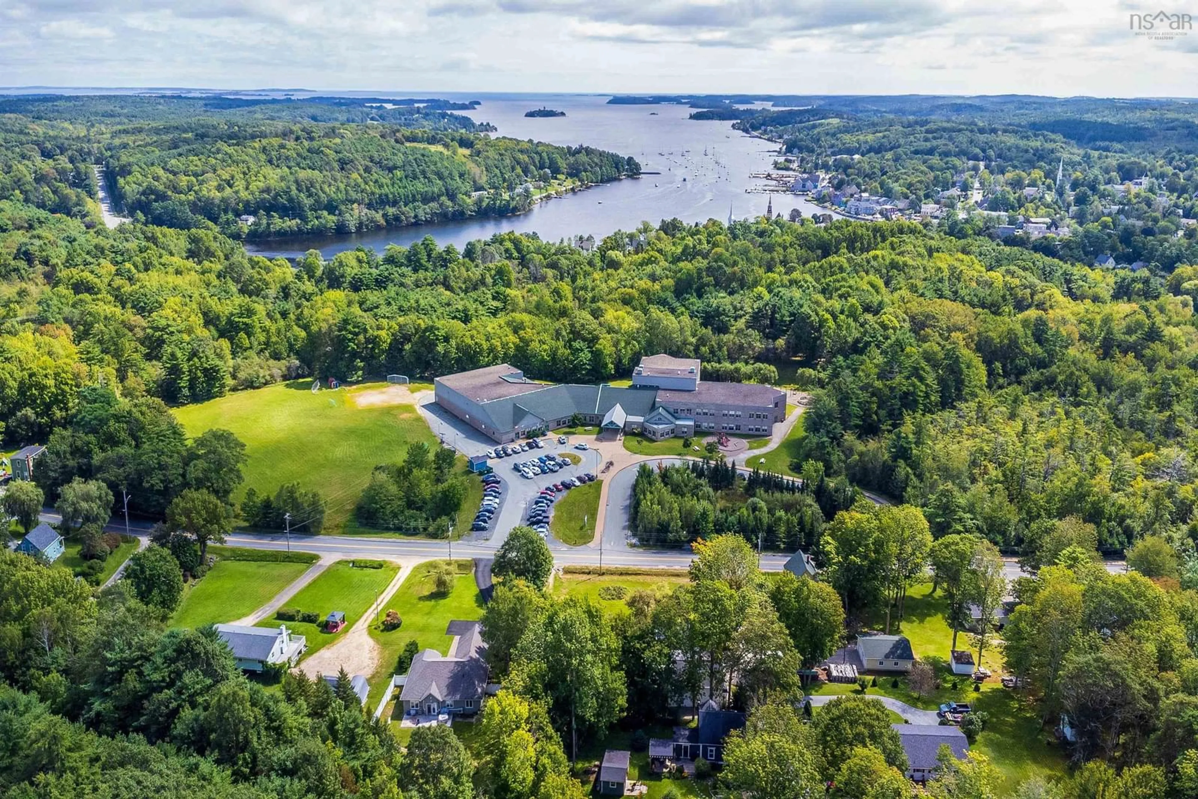 A pic from outside/outdoor area/front of a property/back of a property/a pic from drone, water/lake/river/ocean view for 16 Garden Lane, Mahone Bay Nova Scotia B0J 2E0