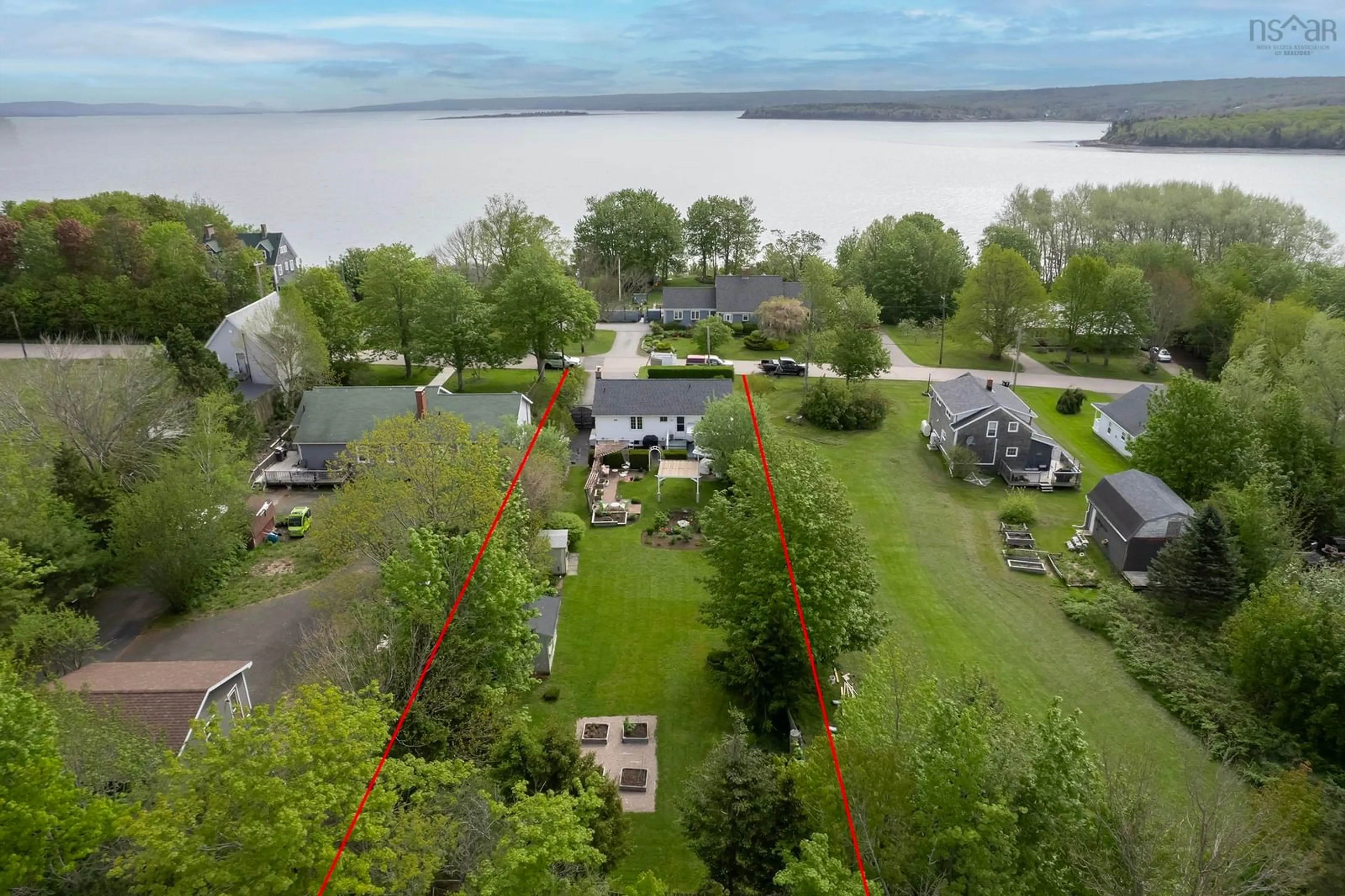 A pic from outside/outdoor area/front of a property/back of a property/a pic from drone, water/lake/river/ocean view for 35 Montague Row, Digby Nova Scotia B0V 1A0