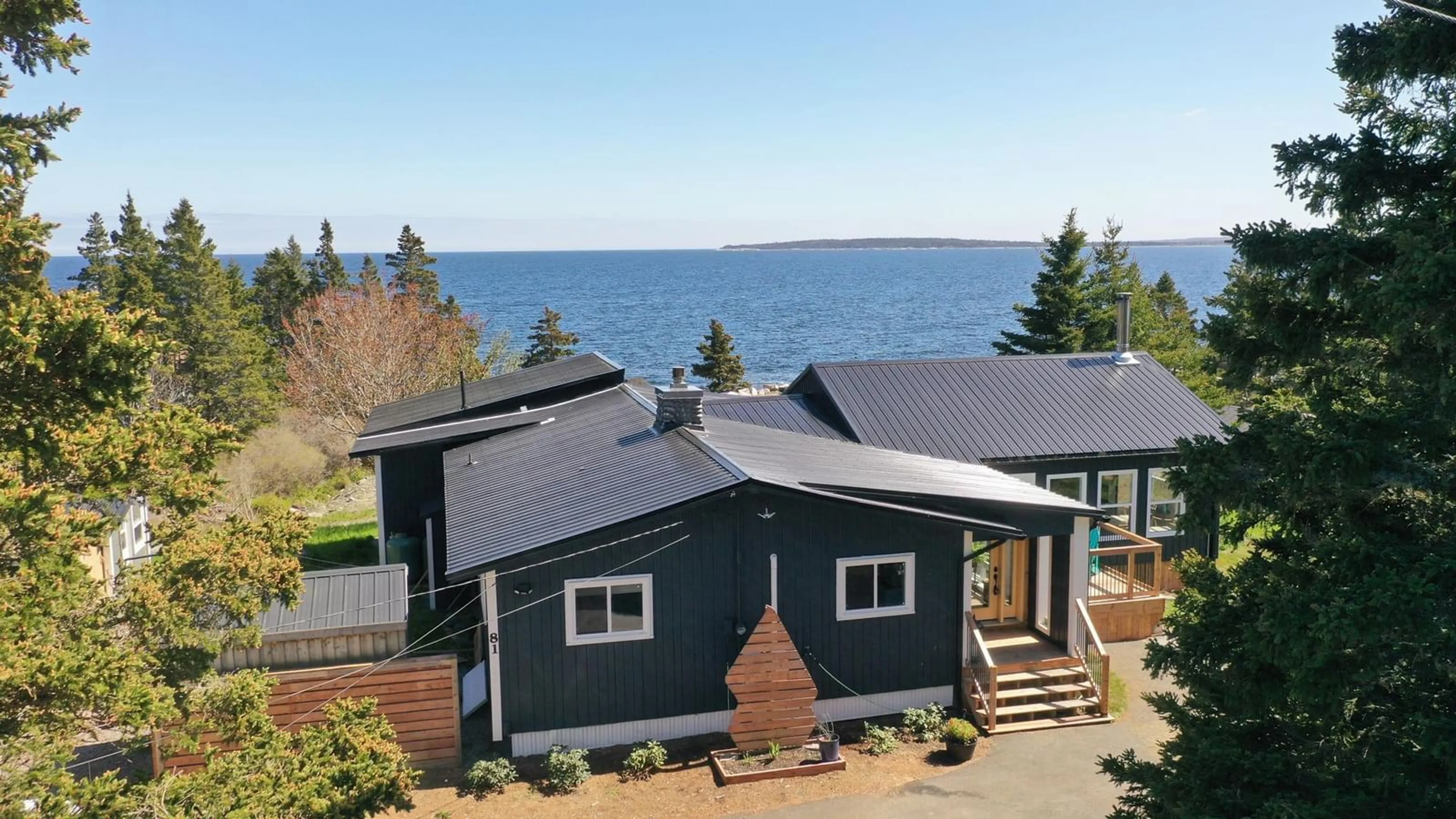 A pic from outside/outdoor area/front of a property/back of a property/a pic from drone, water/lake/river/ocean view for 81 Hunts Point Wharf Rd, Hunts Point Nova Scotia B0T 1G0