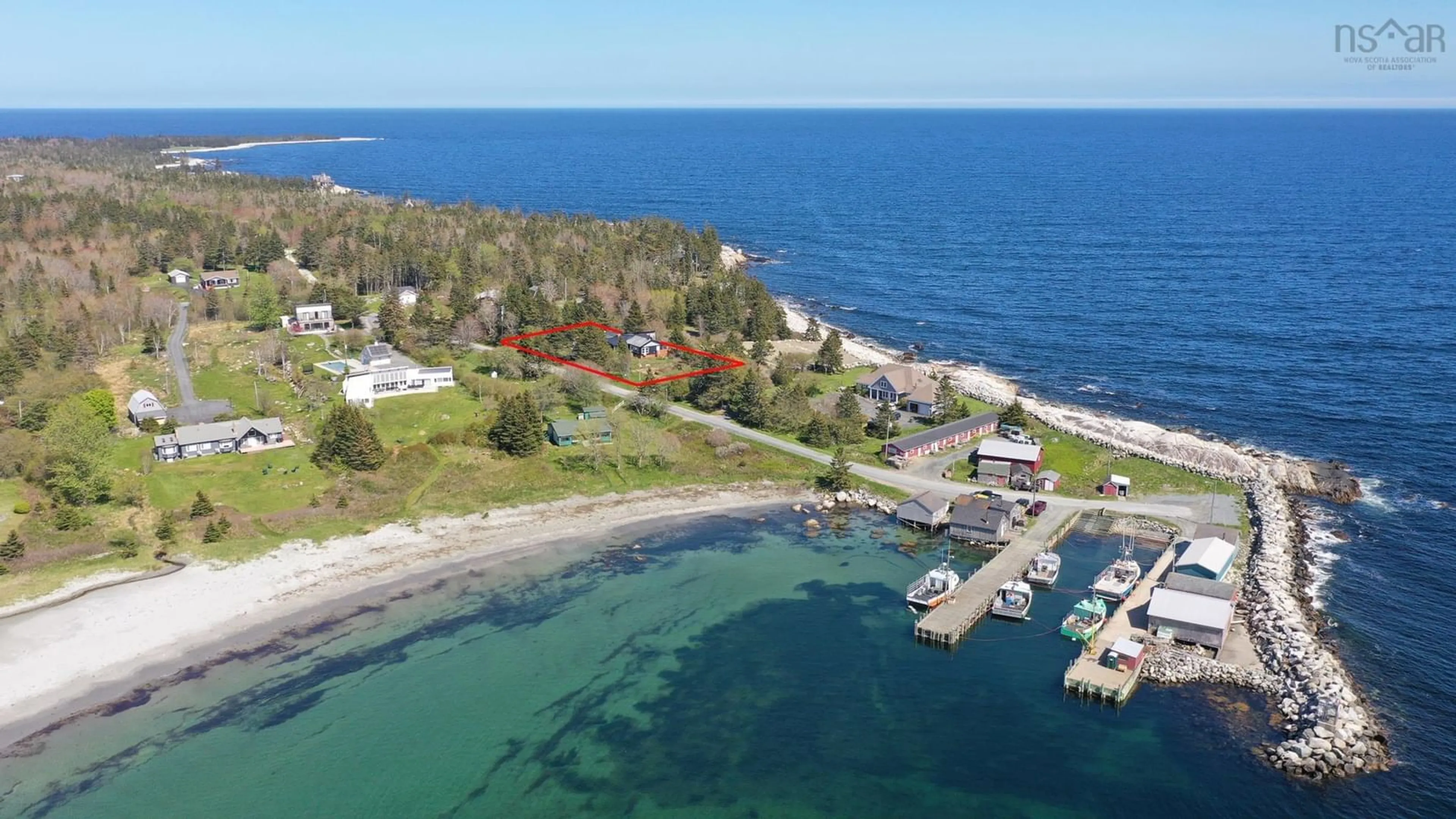 A pic from outside/outdoor area/front of a property/back of a property/a pic from drone, water/lake/river/ocean view for 81 Hunts Point Wharf Rd, Hunts Point Nova Scotia B0T 1G0