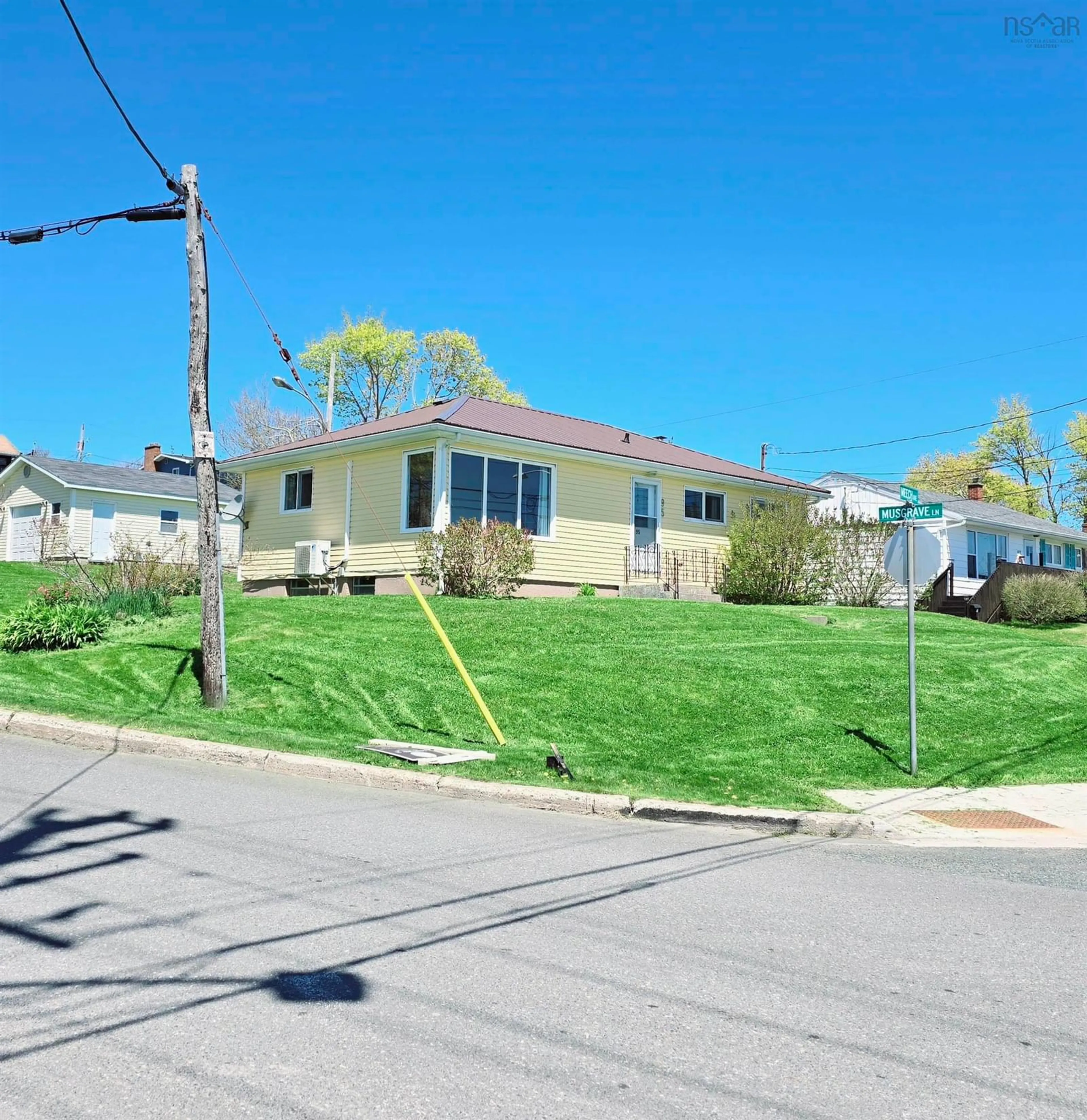A pic from outside/outdoor area/front of a property/back of a property/a pic from drone, street for 95 Meech Ave, North Sydney Nova Scotia B2A 1R9
