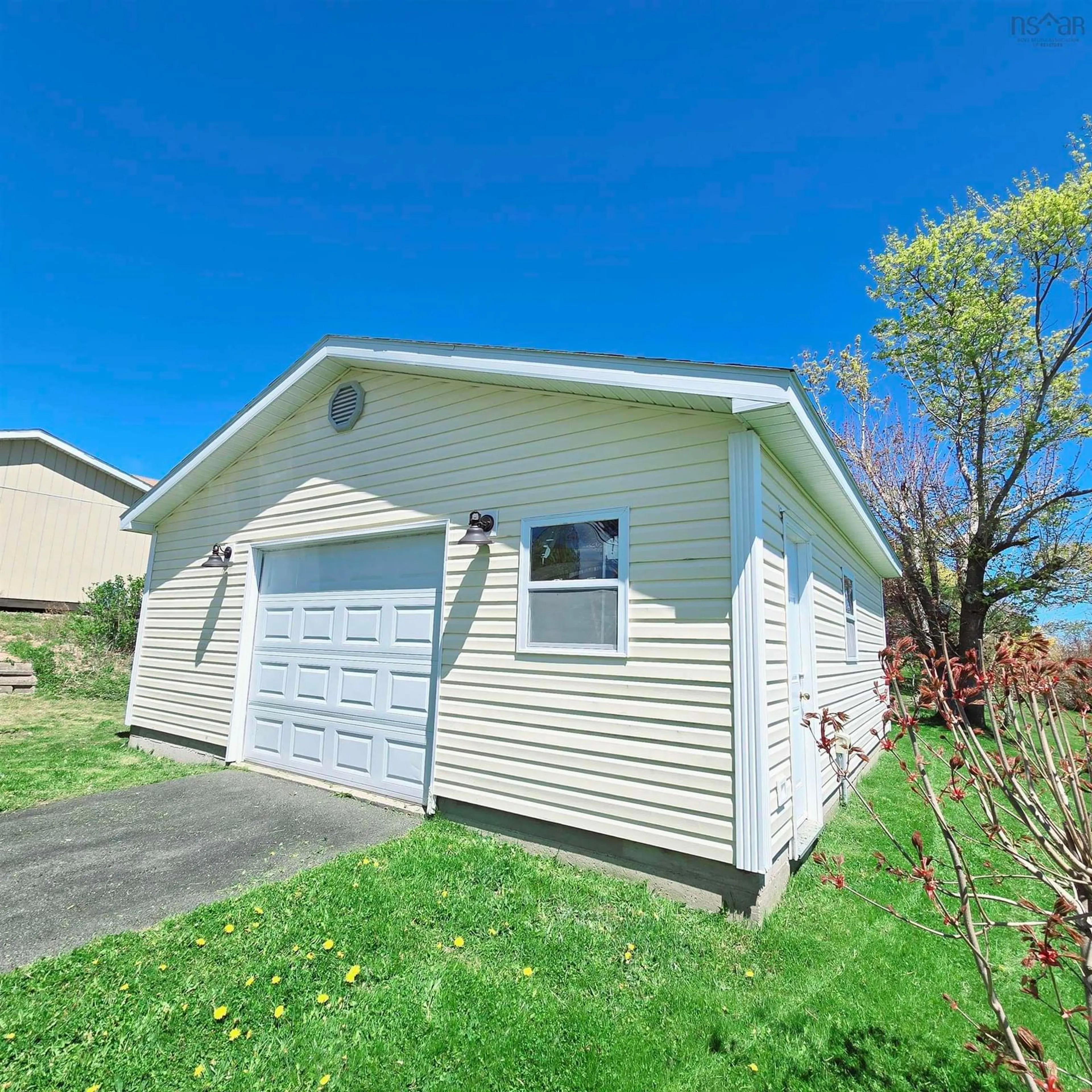 Home with vinyl exterior material, street for 95 Meech Ave, North Sydney Nova Scotia B2A 1R9