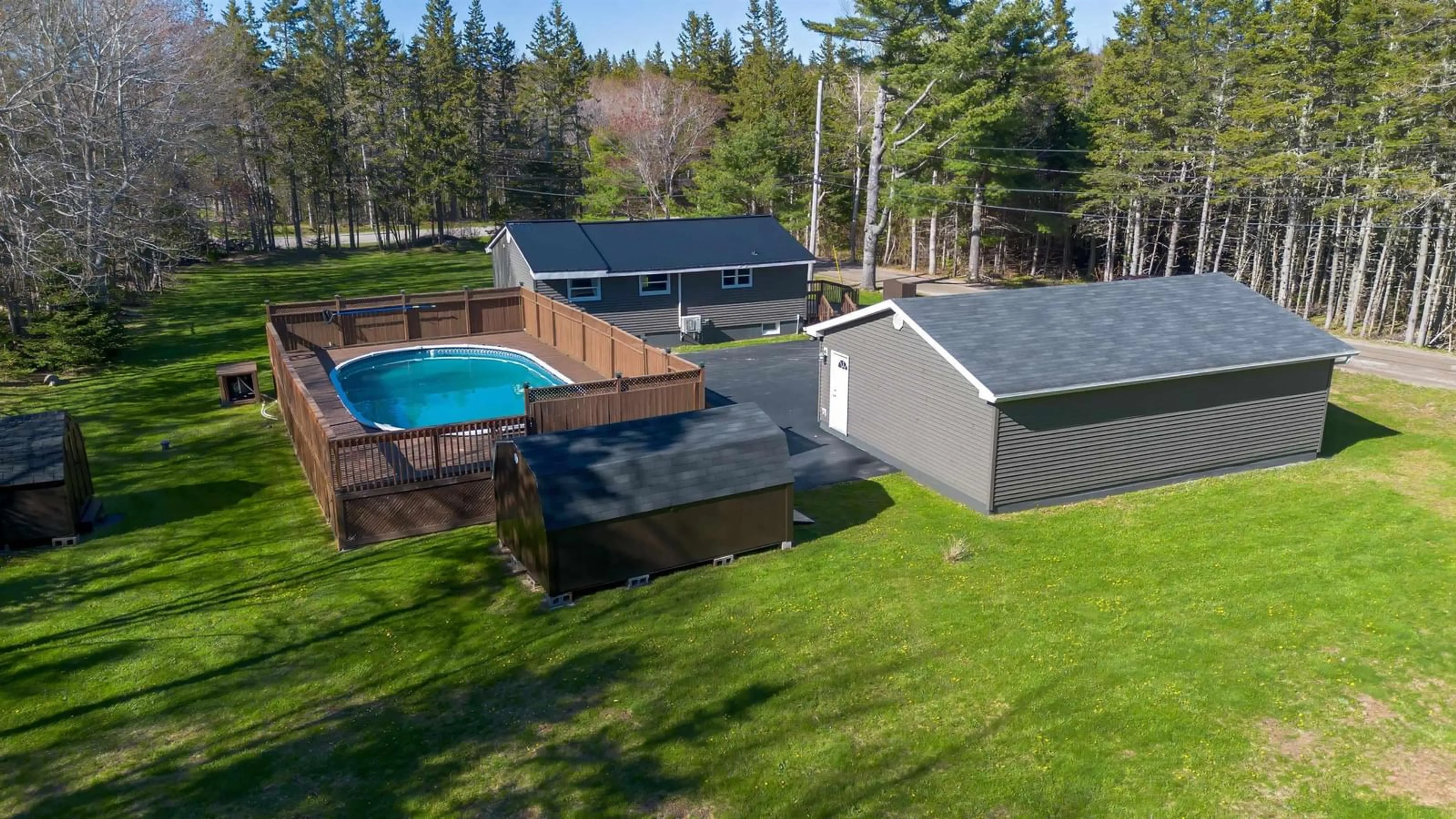 A pic from outside/outdoor area/front of a property/back of a property/a pic from drone, water/lake/river/ocean view for 4 Macinnis Dr, Millville Nova Scotia B1Y 2H7