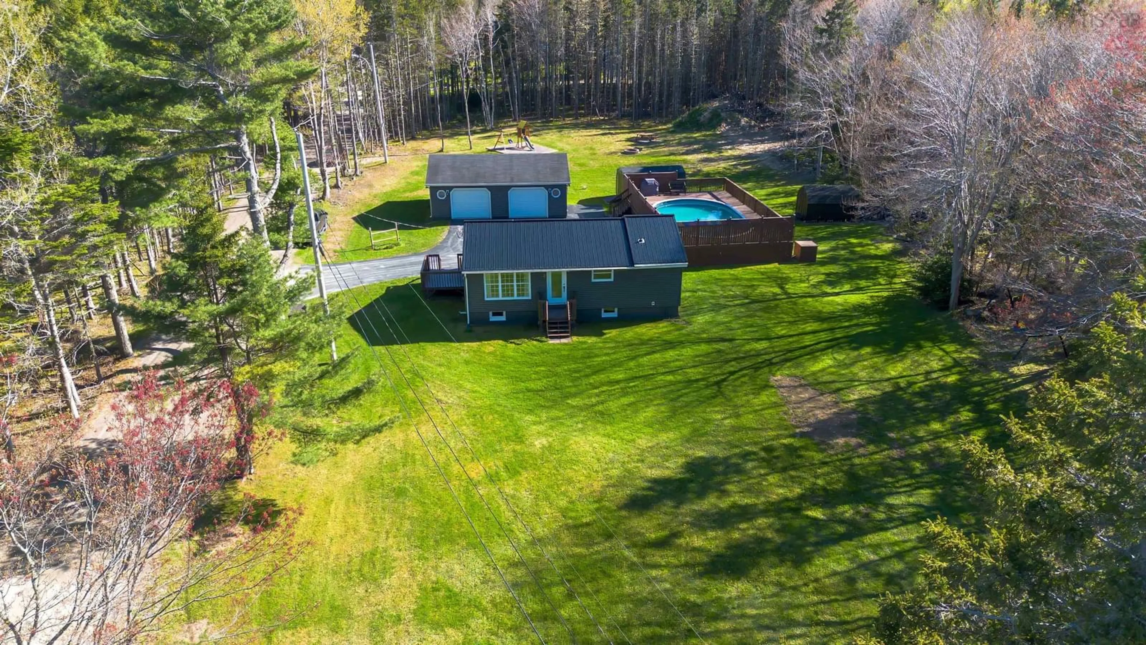 A pic from outside/outdoor area/front of a property/back of a property/a pic from drone, unknown for 4 Macinnis Dr, Millville Nova Scotia B1Y 2H7