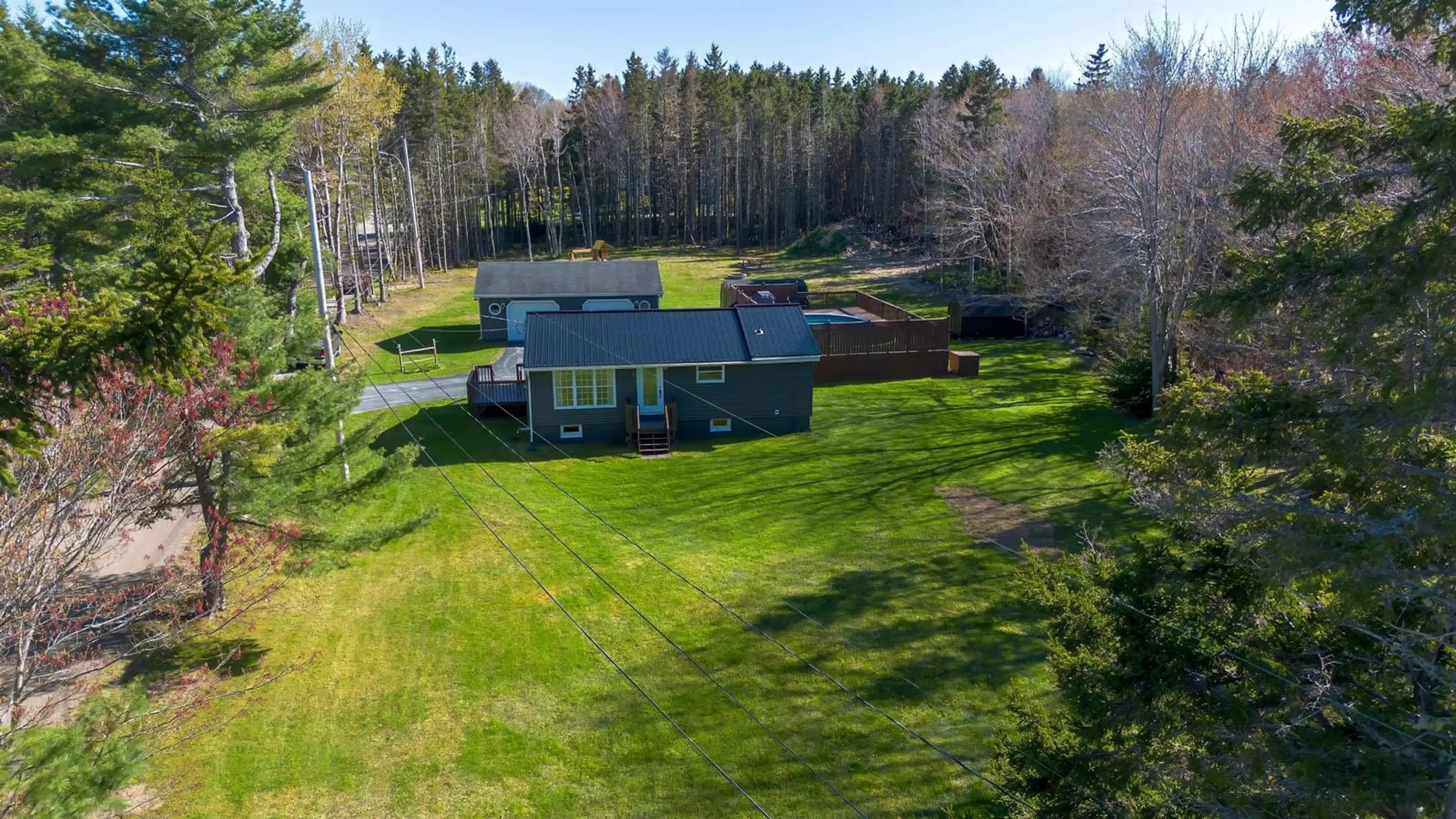 A pic from outside/outdoor area/front of a property/back of a property/a pic from drone, unknown for 4 Macinnis Dr, Millville Nova Scotia B1Y 2H7