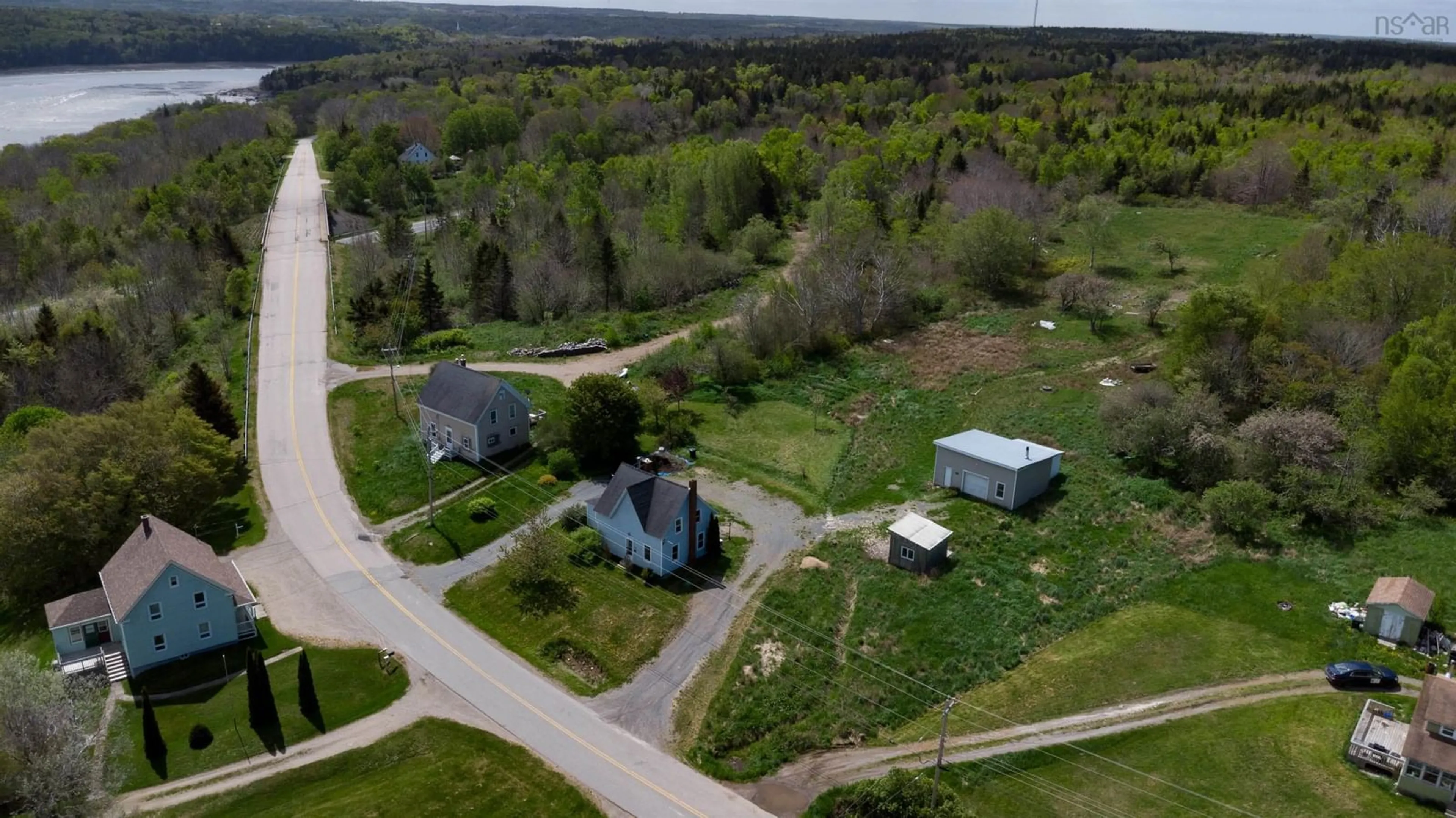 A pic from outside/outdoor area/front of a property/back of a property/a pic from drone, street for 1156 Riverside Road, New Edinburgh Nova Scotia B0W 3T0