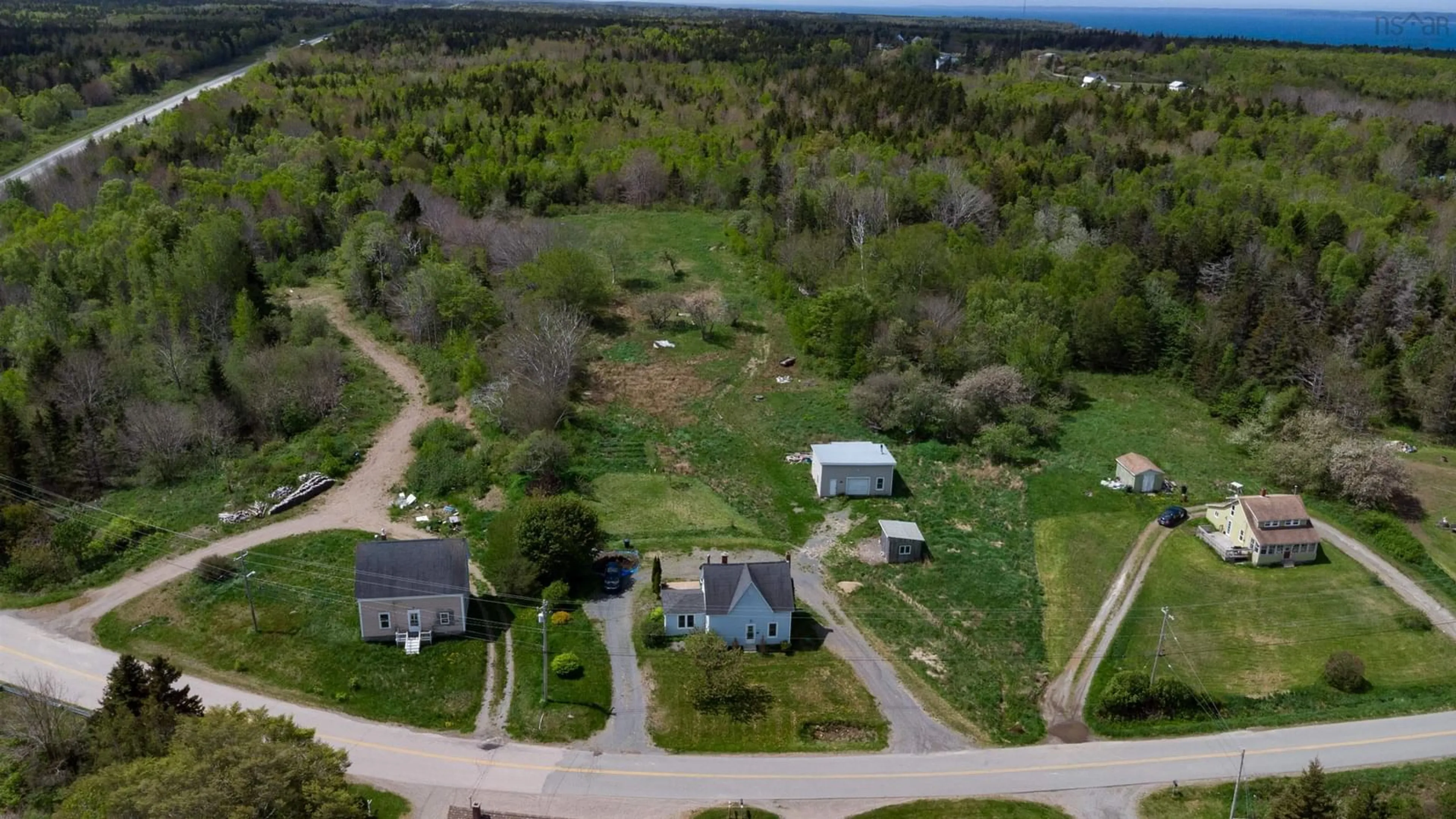A pic from outside/outdoor area/front of a property/back of a property/a pic from drone, street for 1156 Riverside Road, New Edinburgh Nova Scotia B0W 3T0