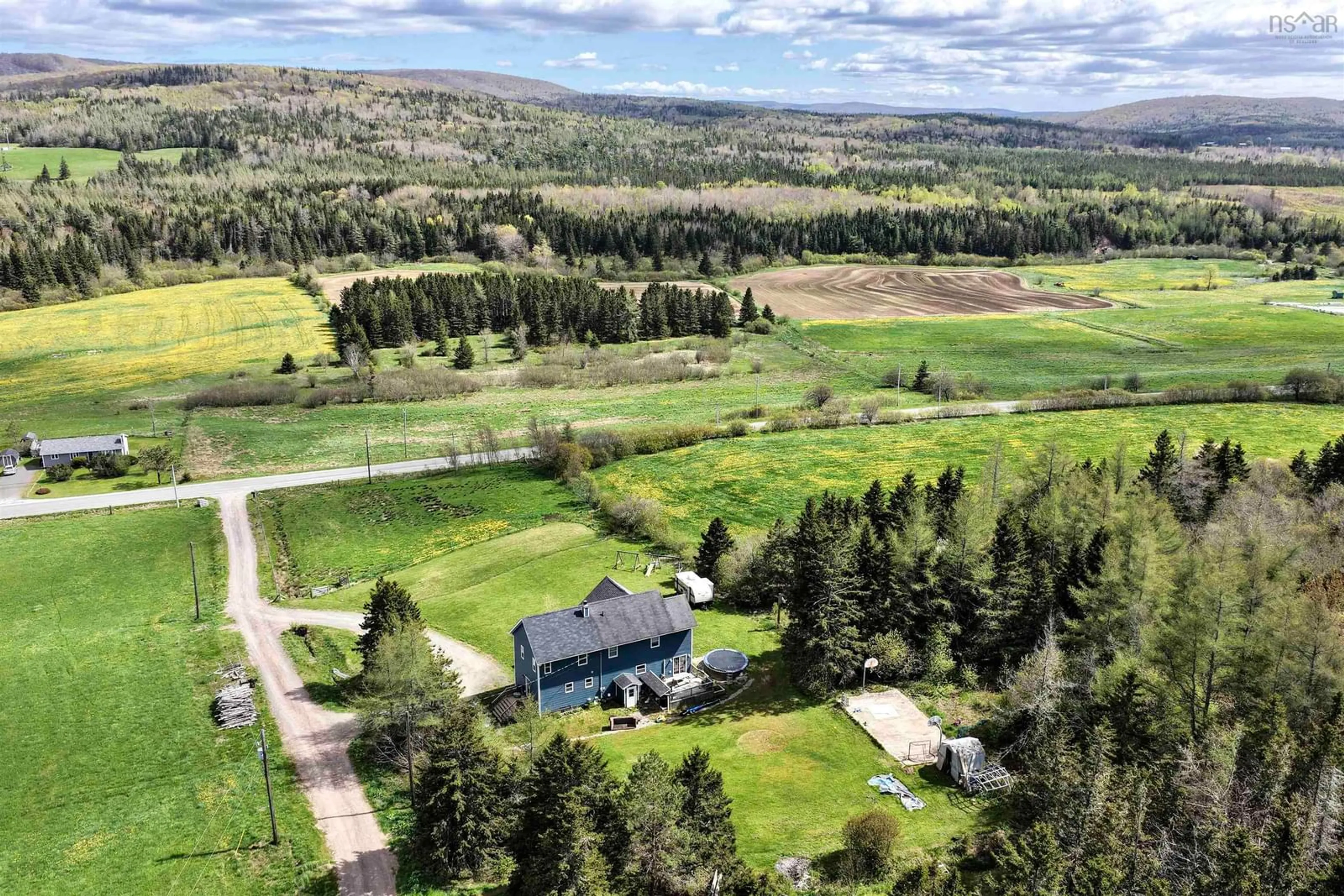 A pic from outside/outdoor area/front of a property/back of a property/a pic from drone, unknown for 3538 Highway 252, Brook Village Nova Scotia B0E 1X0