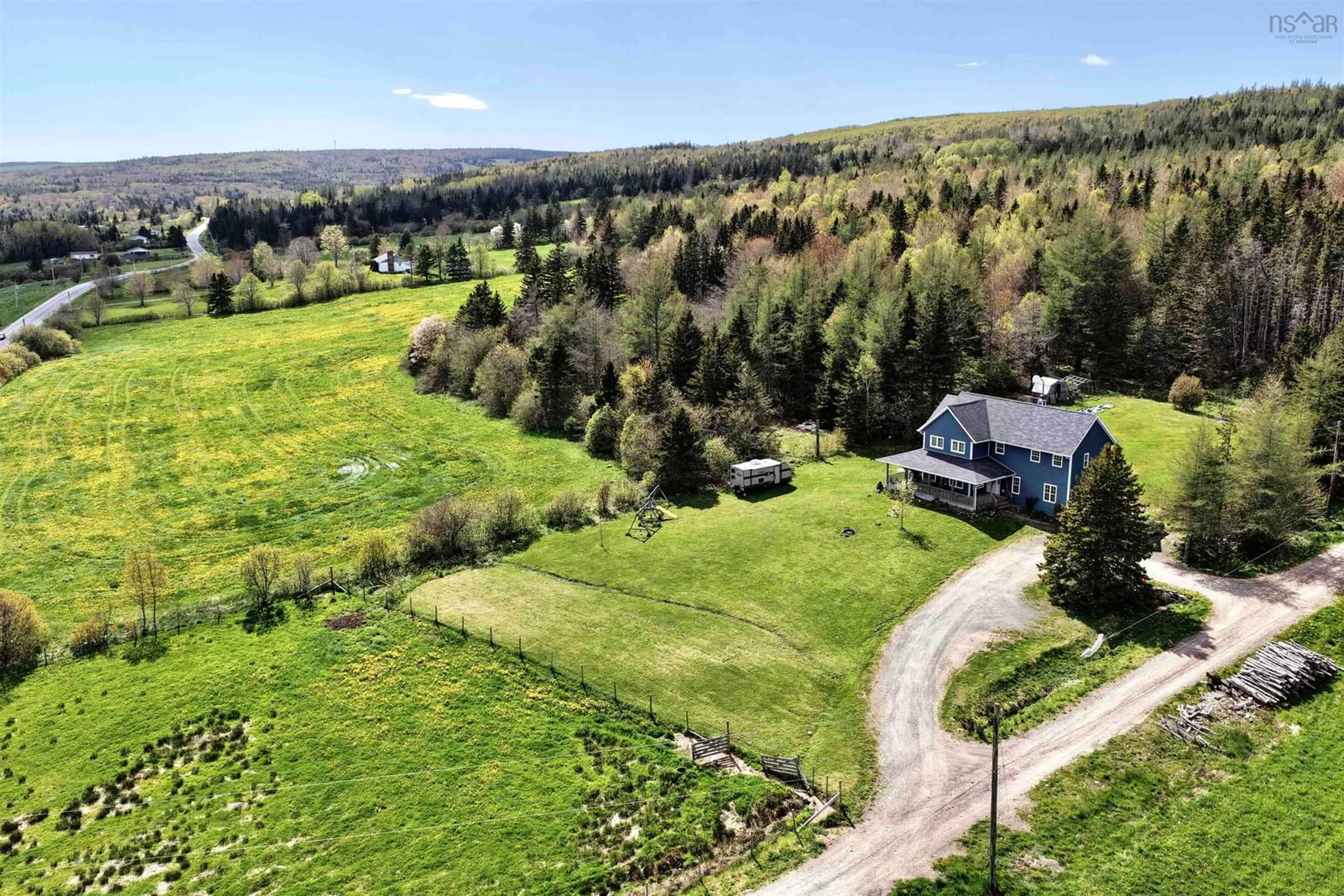 A pic from outside/outdoor area/front of a property/back of a property/a pic from drone, mountain view for 3538 Highway 252, Brook Village Nova Scotia B0E 1X0