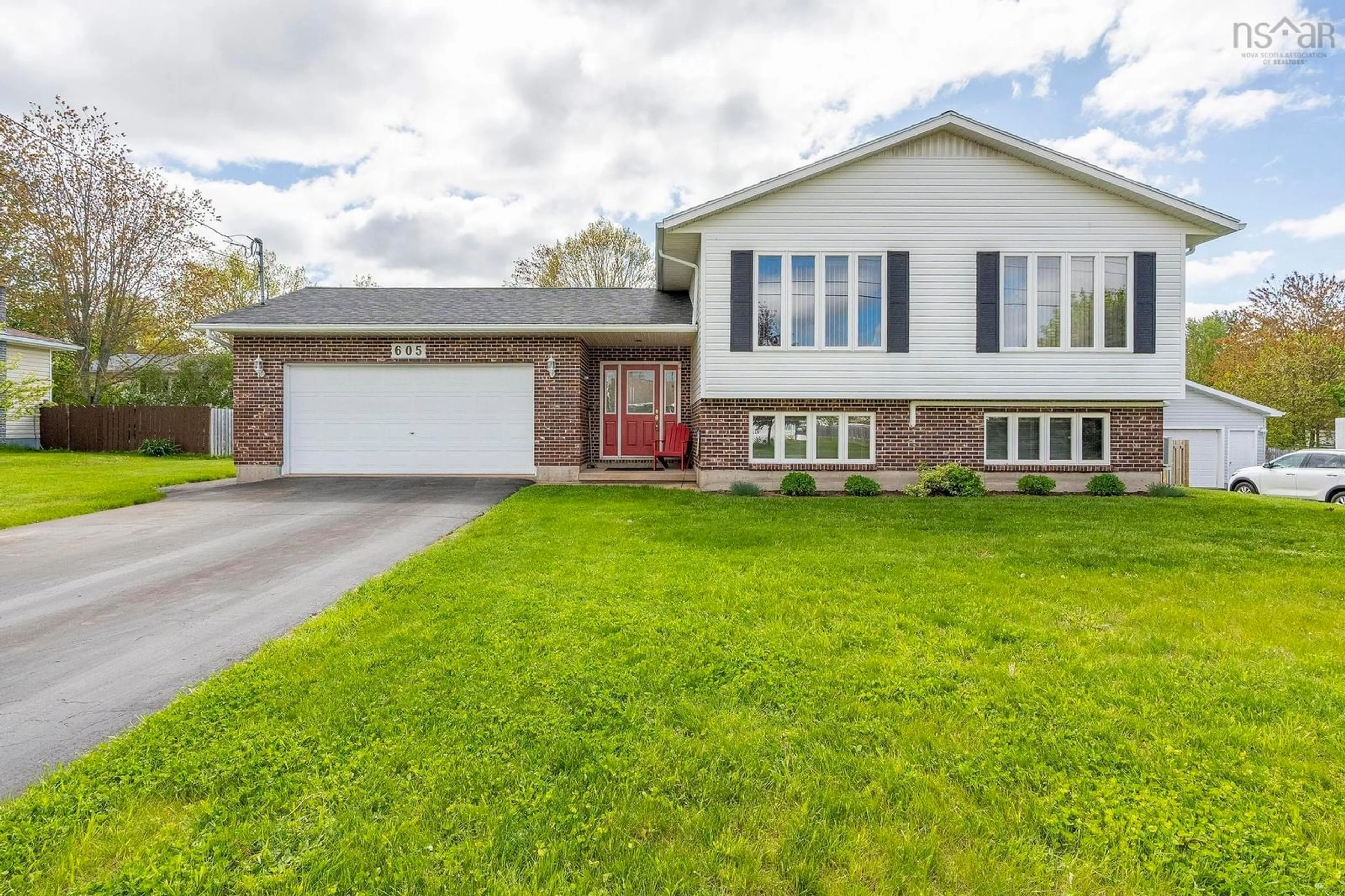 Home with vinyl exterior material, street for 605 Crystal Drive, Greenwood Nova Scotia B0P 1R0